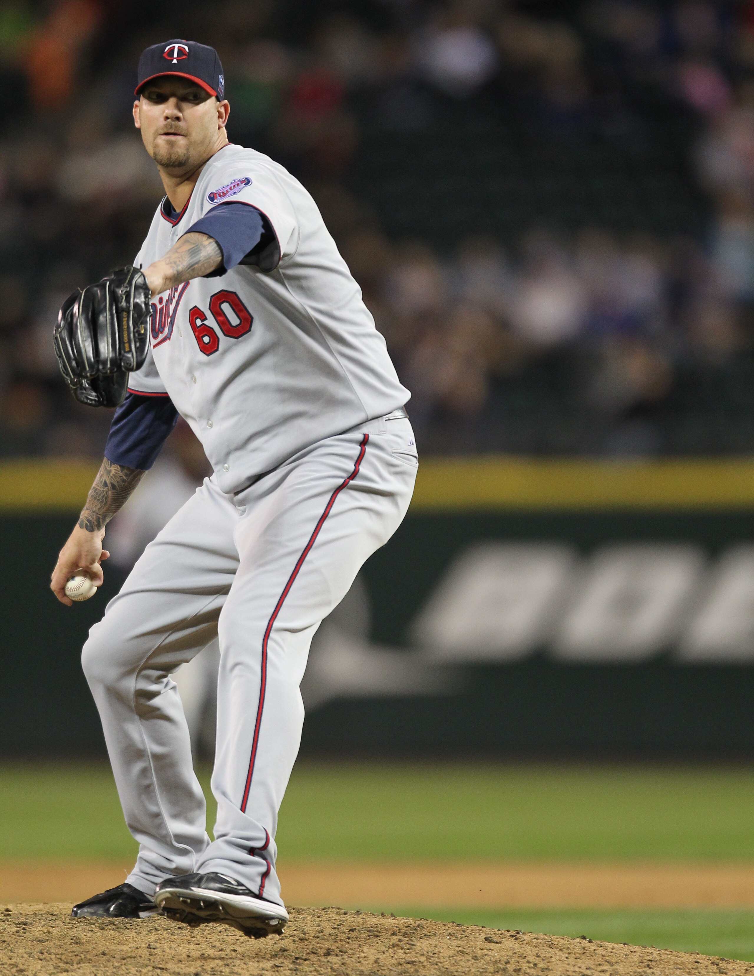 SEATTLE - AUGUST 27: Relief pitcher Jon Rauch #60 of the Minnesota Twins pitches against the Seattle Mariners at Safeco Field on August 27, 2010 in Seattle, Washington. The Twins won 6-3. (Photo by Otto Greule Jr/Getty Images) SEATTLE - AUGUST 27: Relief pitcher Jon Rauch #60 of the Minnesota Twins pitches against the Seattle Mariners at Safeco Field on August 27, 2010 in Seattle, Washington. The Twins won 6-3. (Photo by Otto Greule Jr/Getty Images)
