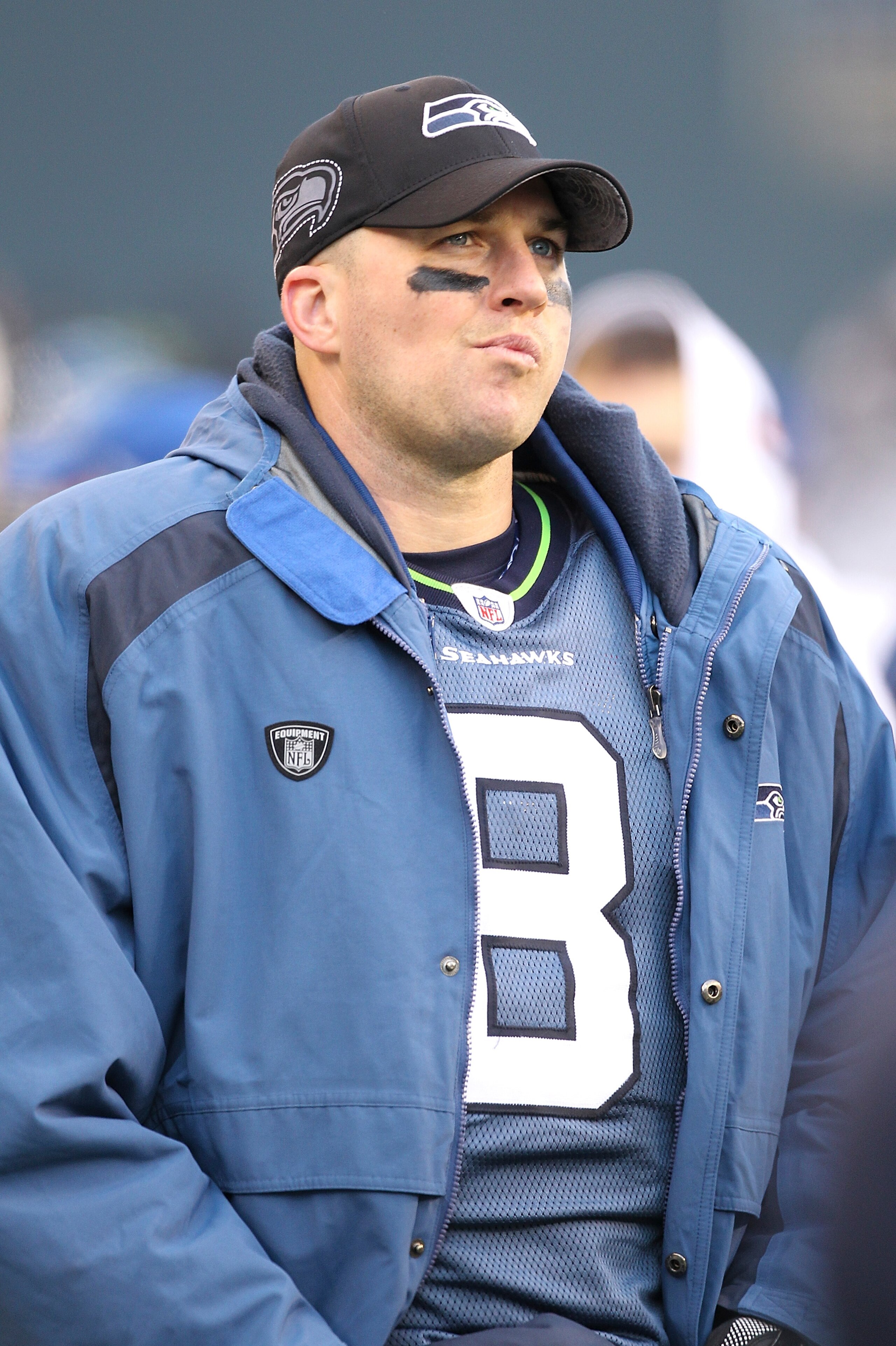 SEATTLE - DECEMBER 19:  Quarterback Matt Hasselbeck #8 of the Seattle Seahawks looks on from the bench after being removed from the game in the second half against the Atlanta Falcons at Qwest Field on December 19, 2010 in Seattle, Washington. The Falcons