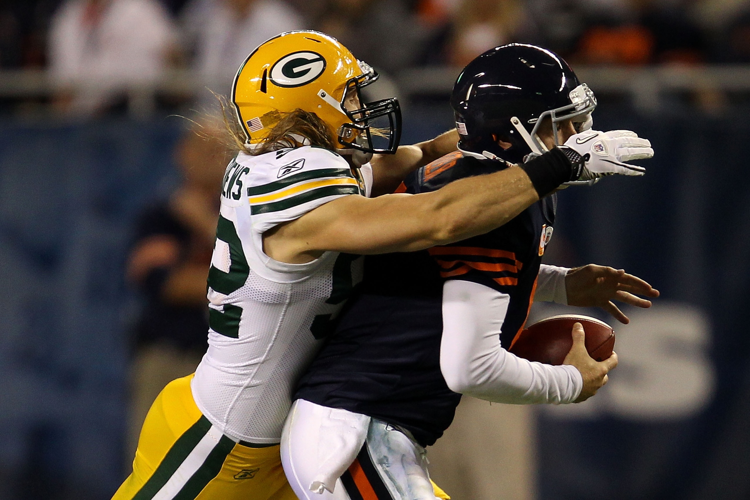 CHICAGO - SEPTEMBER 27:  Clay Matthews #52 of the Green Bay Packers is called for a facemask as he pulls down Jay Cutler #6 of the Chicago Bears in the first quarter at Soldier Field on September 27, 2010 in Chicago, Illinois.  (Photo by Jonathan Daniel/G