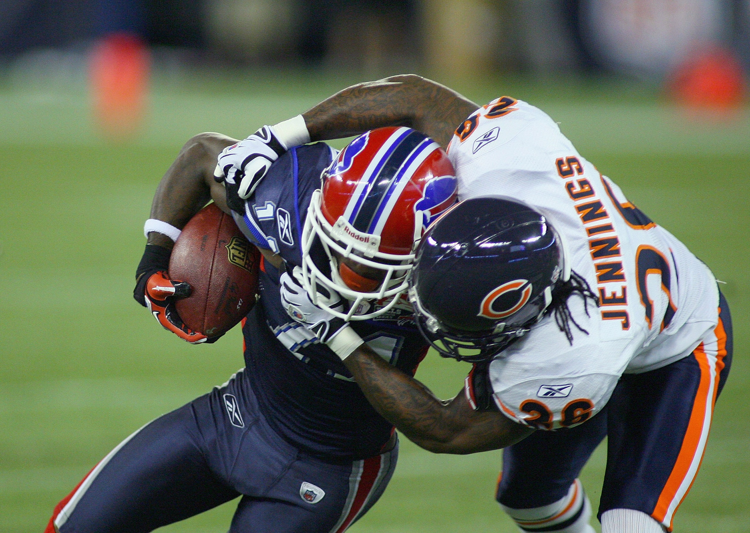 TORONTO, ON - NOVEMBER 07:  Roscoe Parrish #11 of the Buffalo Bills is tackled by Tim Jennings #26 of the Chicago Bears at Rogers Centre on November 7, 2010 in Toronto, Canada. Chicago won 22-19.  (Photo by Rick Stewart/Getty Images)