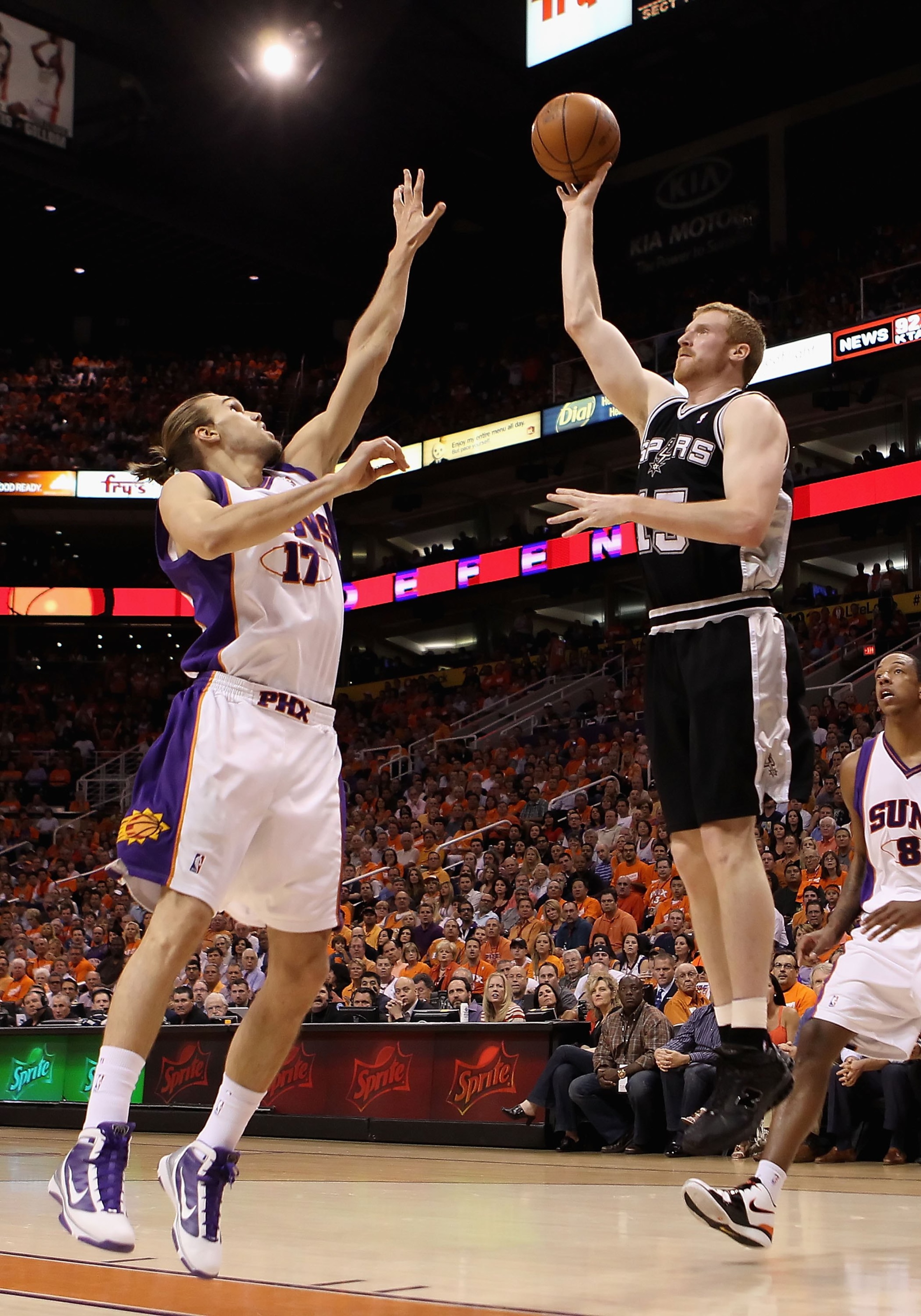 PHOENIX - MAY 03:  Matt Bonner #15 of the San Antonio Spurs puts up a shot against Louis Amundson #17 of the Phoenix Suns during Game One of the Western Conference Semifinals of the 2010 NBA Playoffs at US Airways Center on May 3, 2010 in Phoenix, Arizona