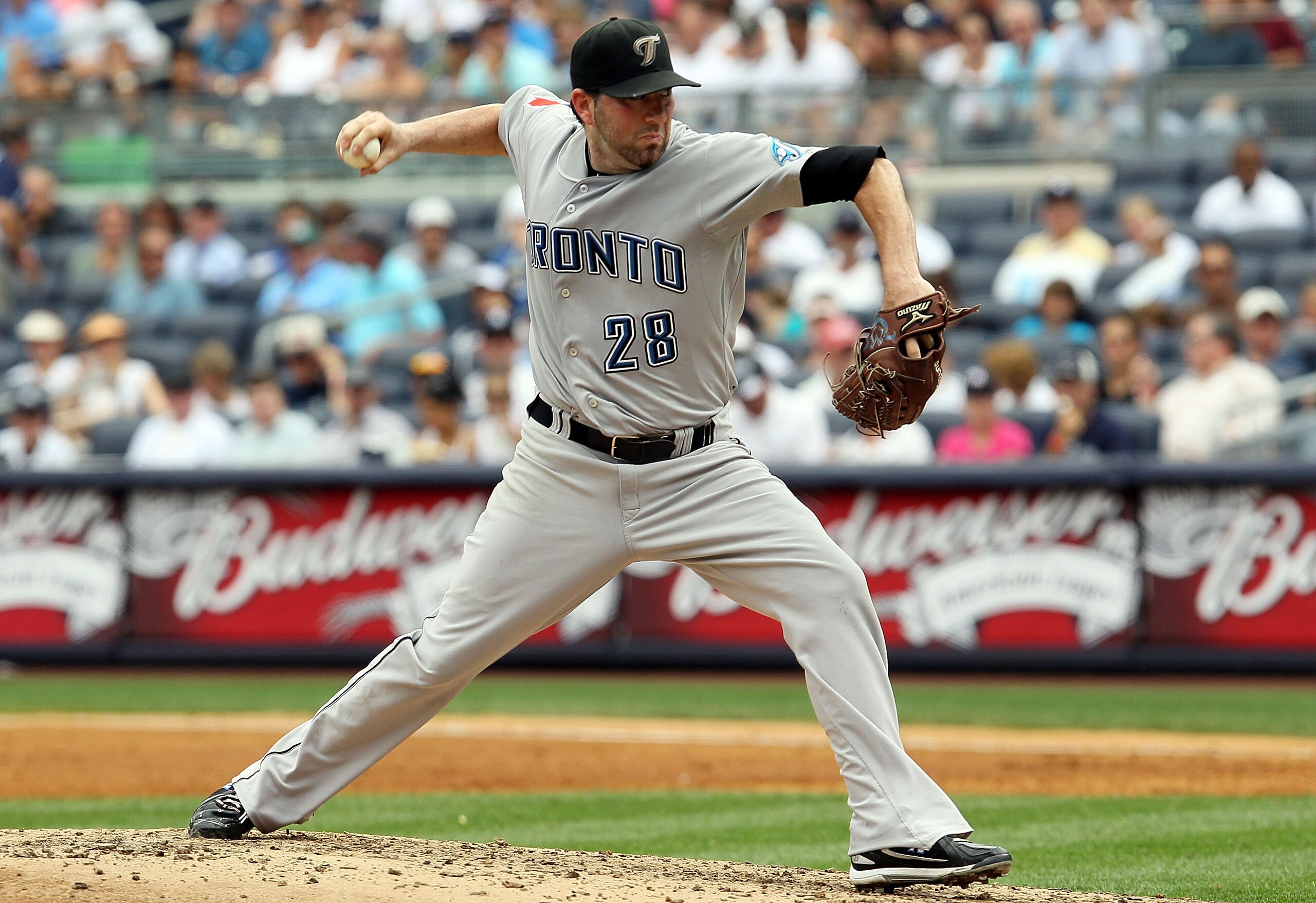NEW YORK - AUGUST 04:  Shaun Marcum #28 of the Toronto Blue Jays delivers a pitch against the New York Yankees on August 4, 2010 at Yankee Stadium in the Bronx borough of New York City.  (Photo by Jim McIsaac/Getty Images)