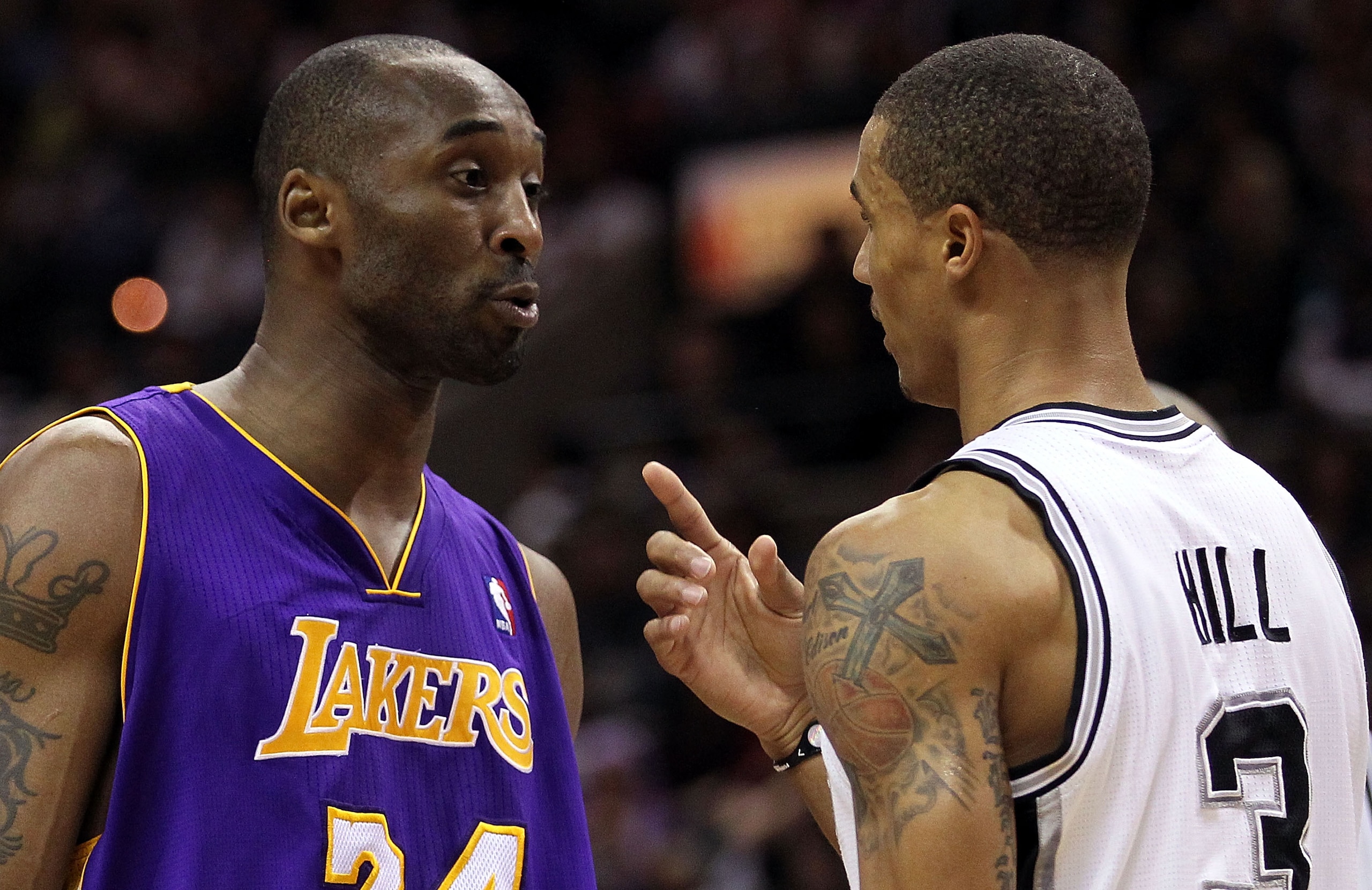 SAN ANTONIO, TX - DECEMBER 28:  Guard Kobe Bryant #24 of the Los Angeles Lakers and George Hill #3 of the San Antonio Spurs confront one another in the second quarter at AT&T Center on December 28, 2010 in San Antonio, Texas.  NOTE TO USER: User expressly