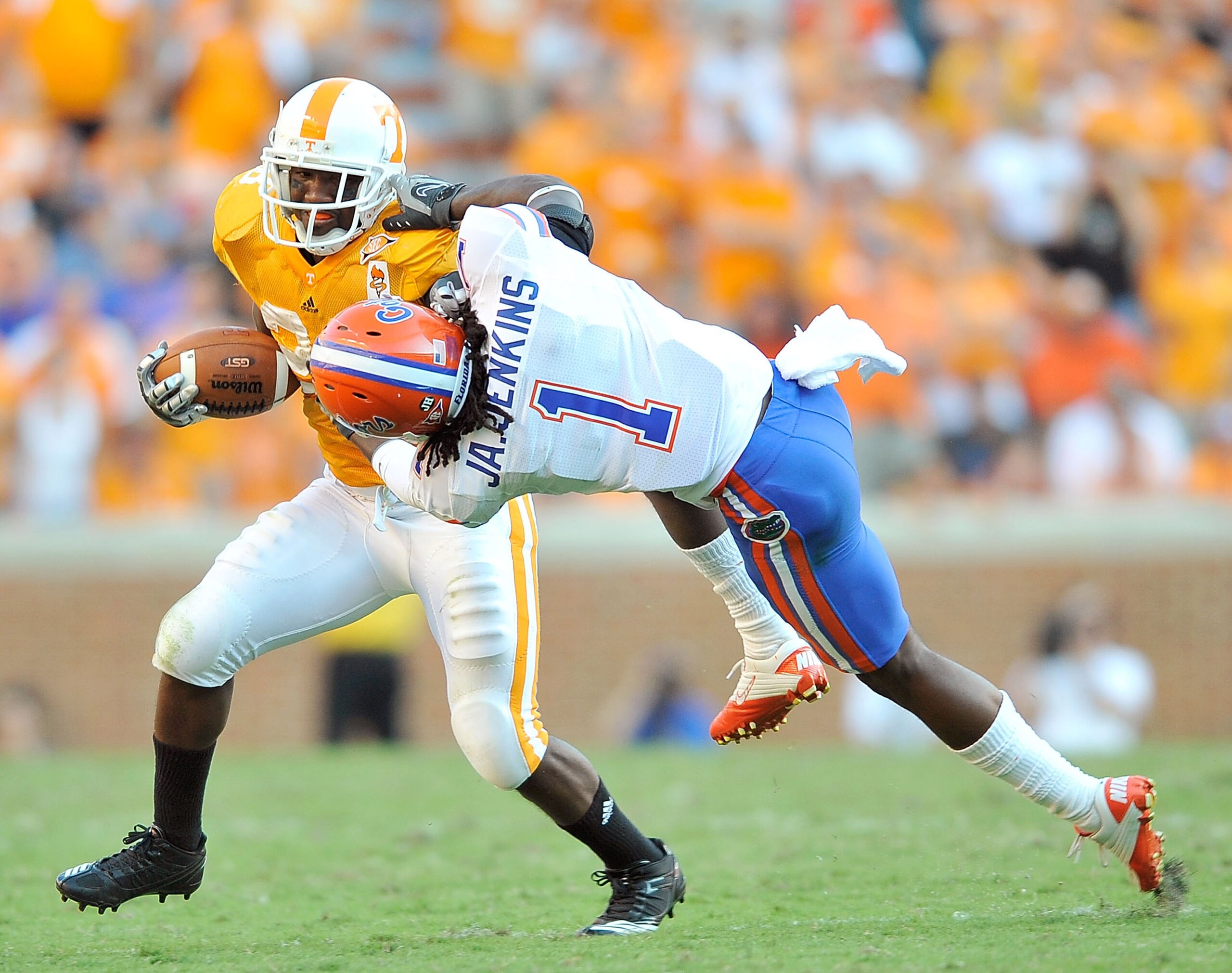 KNOXVILLE, TN - SEPTEMBER 18:  Janoris Jenkins #1 of the Florida Gators fights to bring down Tauren Poole #28 of the Tennessee Volunteers at Neyland Stadium on September 18, 2010 in Knoxville, Tennessee. Florida won 31-17.  (Photo by Grant Halverson/Getty