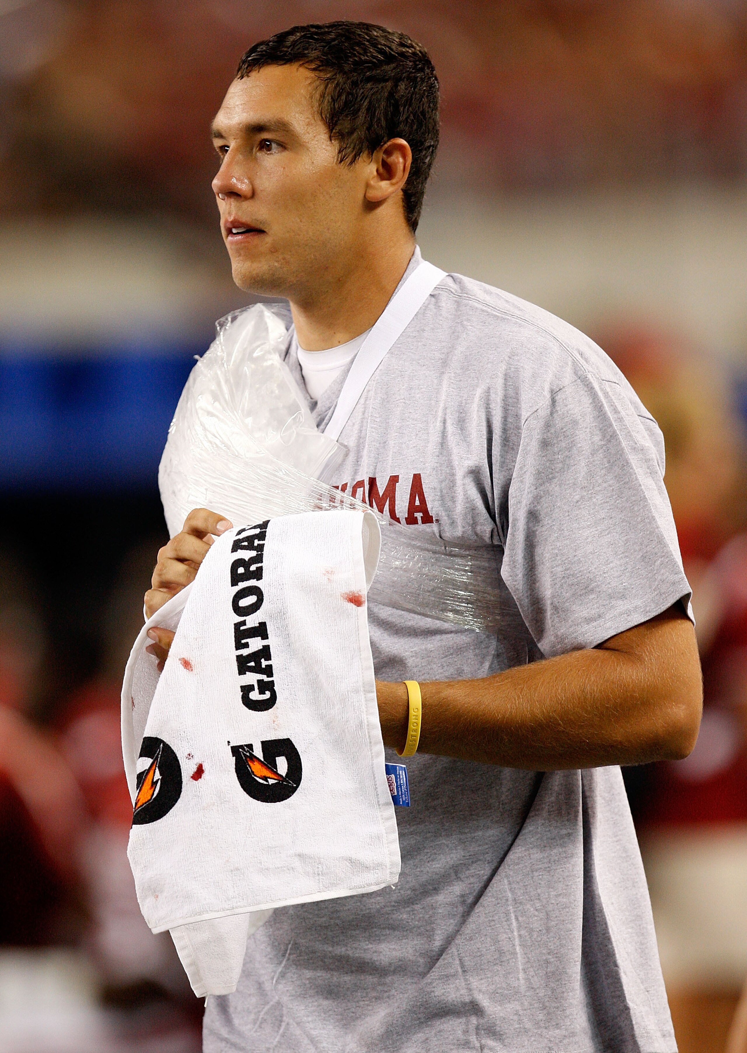 ARLINGTON, TX - SEPTEMBER 05:  Quarterback Sam Bradford #14 of the Oklahoma Sooners on the sidelines after suffering an injury against the Brigham Young Cougars at Cowboys Stadium on September 5, 2009 in Arlington, Texas.  (Photo by Ronald Martinez/Getty
