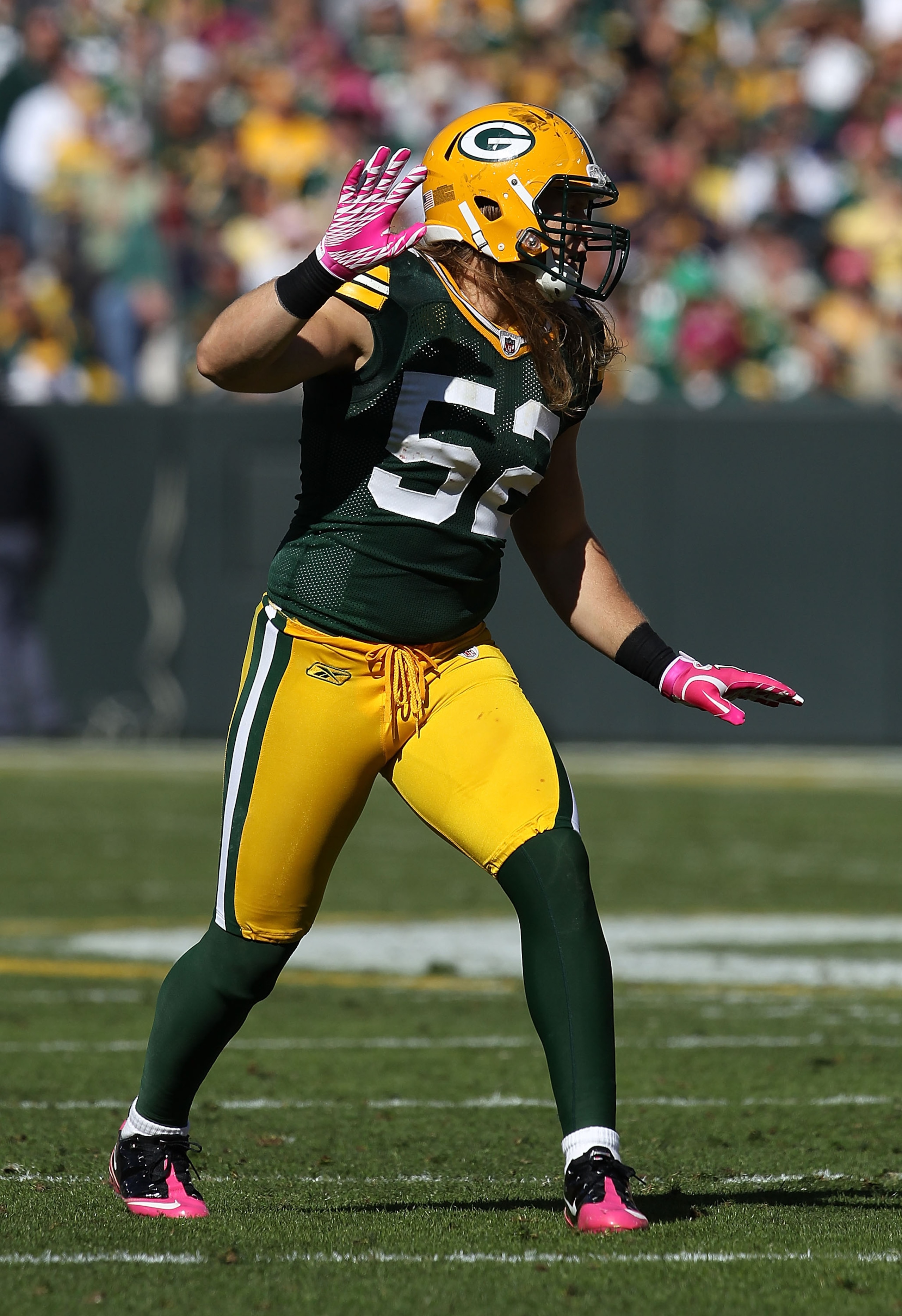 GREEN BAY, WI - OCTOBER 03: Clay Matthews #52 of the Green Bay Packers awaits the start of play against the Detroit Lions at Lambeau Field on October 3, 2010 in Green Bay, Wisconsin. The Packers defeated the Lions 28-26. (Photo by Jonathan Daniel/Getty Im