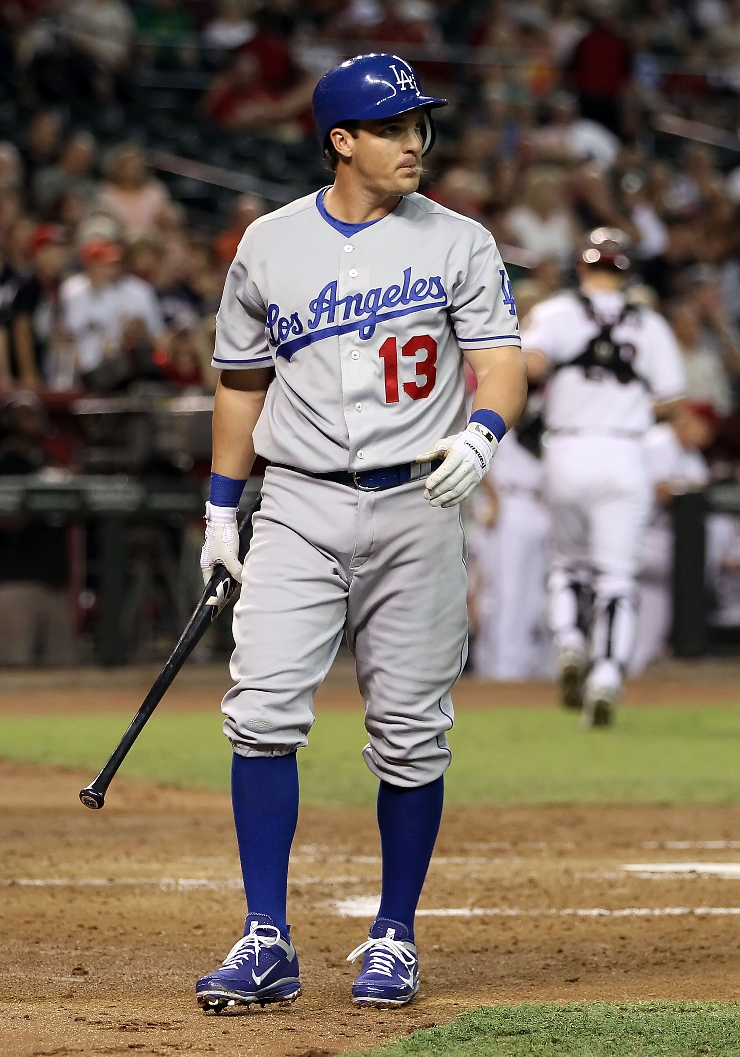 PHOENIX - SEPTEMBER 24:  Ryan Theriot #13 of the Los Angeles Dodgers strikes out against the Arizona Diamondbacks during the Major League Baseball game at Chase Field on September 24, 2010 in Phoenix, Arizona.  (Photo by Christian Petersen/Getty Images)