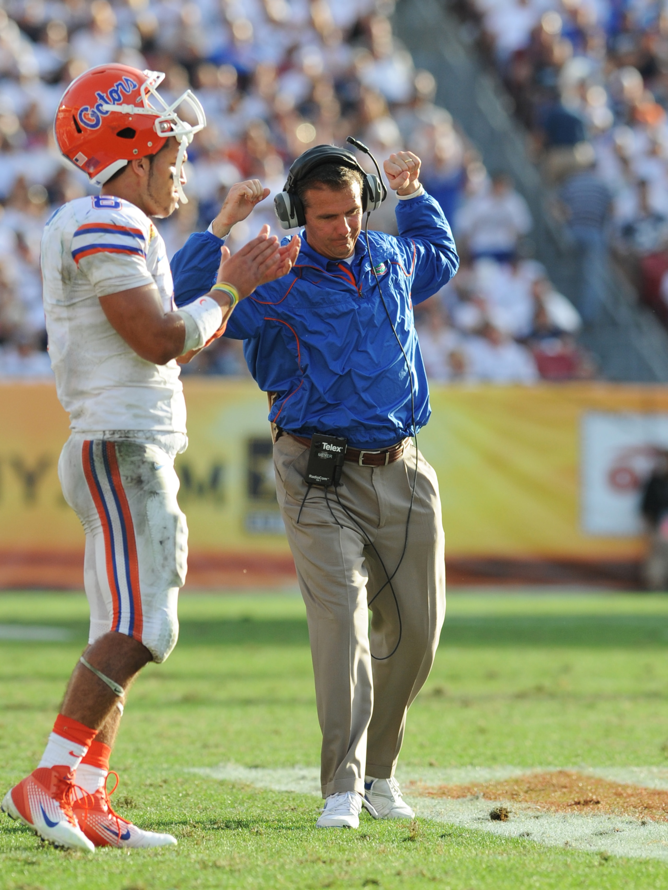 TAMPA, FL - JANUARY 1:  Coach Urban Meyer of the Florida Gators celebrates a touchdown against the Penn State Nittany Lions January 1, 2011 in the 25th Outback Bowl at Raymond James Stadium in Tampa, Florida.  (Photo by Al Messerschmidt/Getty Images)