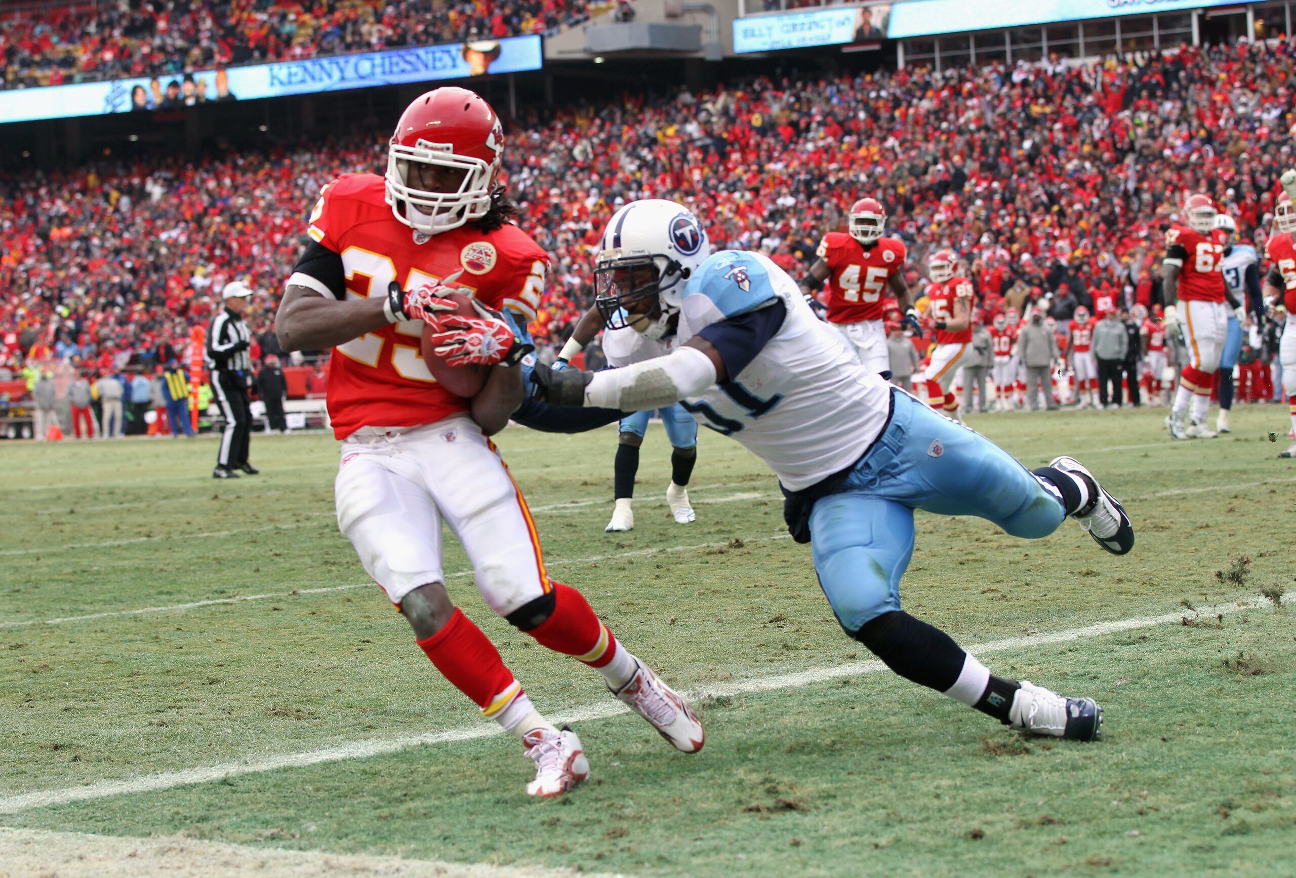 KANSAS CITY, MO - DECEMBER 26: Jamaal Charles #25 of the Kansas City Chiefs makes a catch in the endzone for a touchdown as Gerald McRath #51 of the Tennessee Titans defends during the game on December 26, 2010 at Arrowhead Stadium in Kansas City, Missou KANSAS CITY, MO - DECEMBER 26: Jamaal Charles #25 of the Kansas City Chiefs makes a catch in the endzone for a touchdown as Gerald McRath #51 of the Tennessee Titans defends during the game on December 26, 2010 at Arrowhead Stadium in Kansas City, Missou