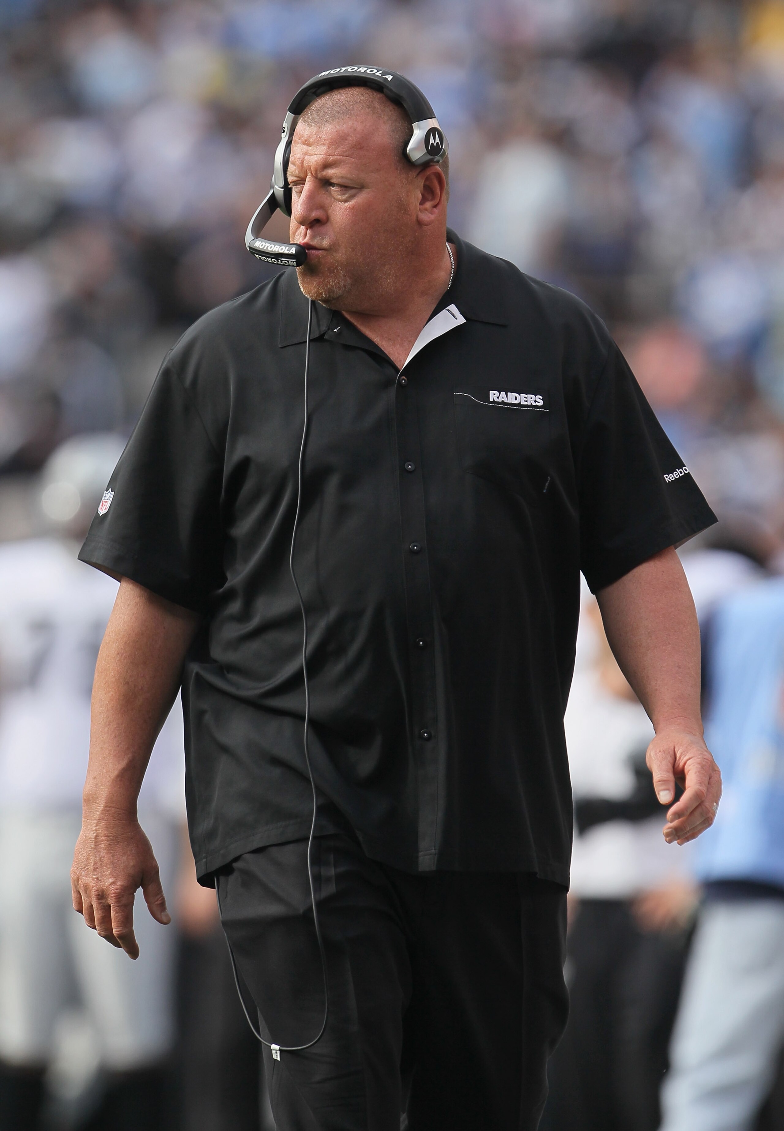 SAN DIEGO - DECEMBER 05:  Oakland Raiders head coach Tom Cable looks on from the sideline against the San Diego Chargers at Qualcomm Stadium on December 5, 2010 in San Diego, California. The Raiders defeated the Chargers 28-13.  (Photo by Jeff Gross/Getty