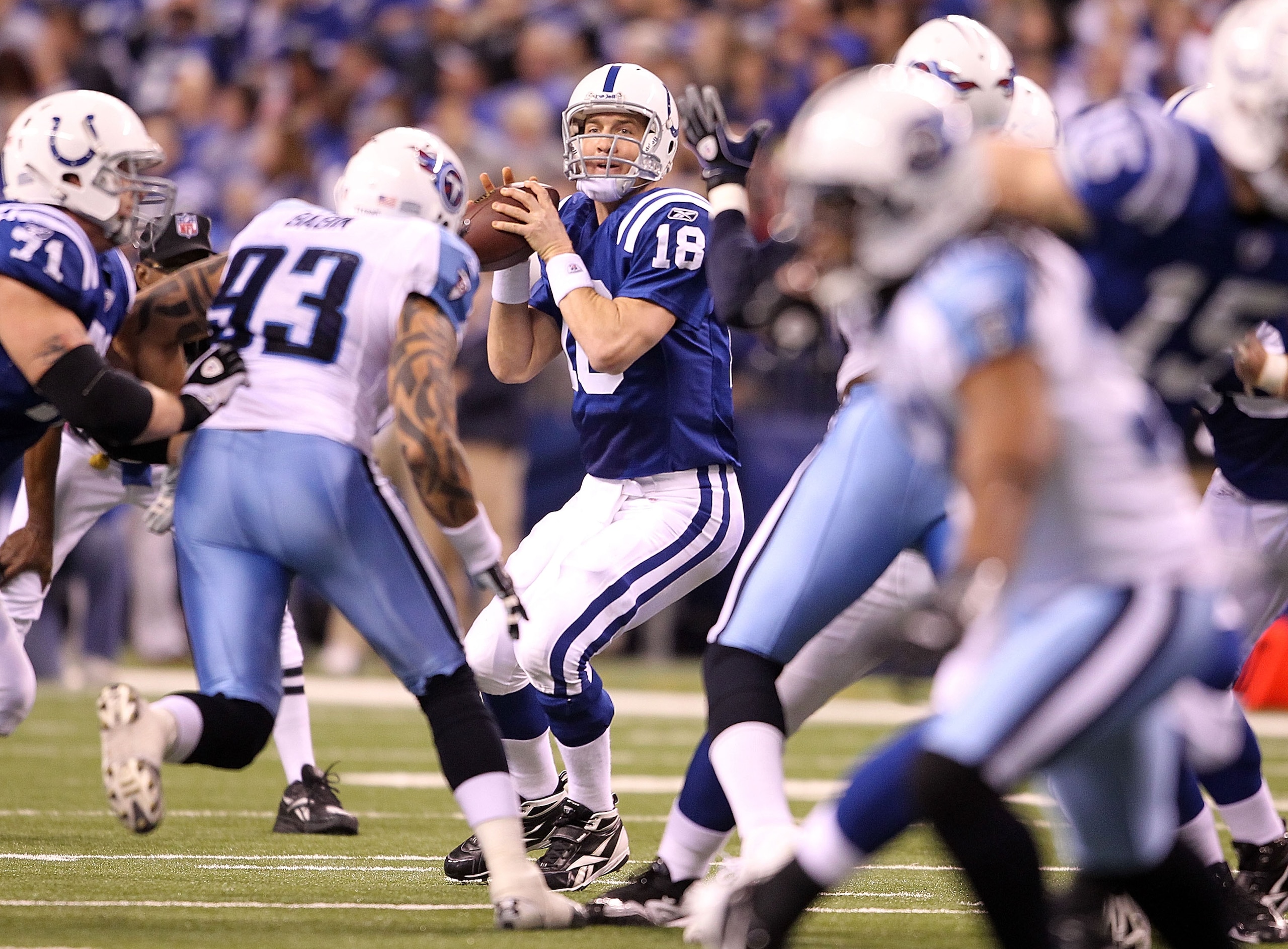INDIANAPOLIS - JANUARY 02: Peyton Manning #18 of the Indianapolis Colts looks to pass the ball during NFL game against the Tennessee Titans at Lucas Oil Stadium on January 2, 2011 in Indianapolis, Indiana. (Photo by Andy Lyons/Getty Images) INDIANAPOLIS - JANUARY 02: Peyton Manning #18 of the Indianapolis Colts looks to pass the ball during NFL game against the Tennessee Titans at Lucas Oil Stadium on January 2, 2011 in Indianapolis, Indiana. (Photo by Andy Lyons/Getty Images)
