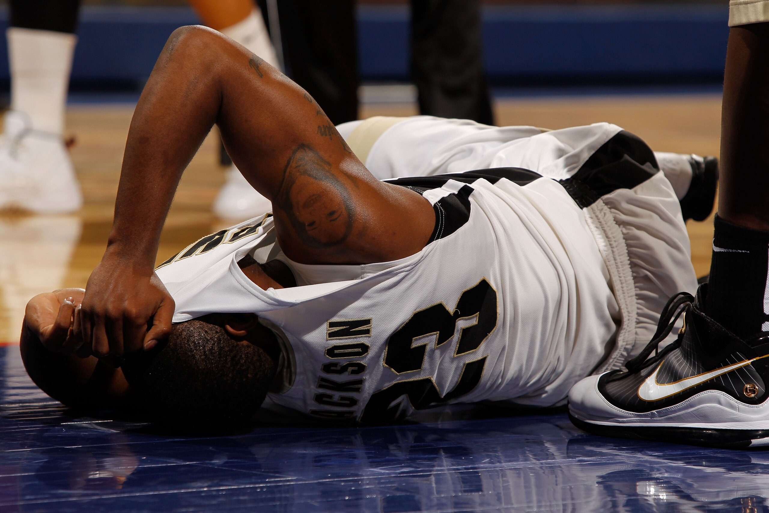 INDIANAPOLIS - MARCH 13: Guard Lewis Jackson #23 of the Purdue Boilermakers lays on the court after injuring himself during the game against the Minnesota Golden Gophers in the semifinals of the Big Ten Men's Basketball Tournament at Conseco Fieldhouse o INDIANAPOLIS - MARCH 13: Guard Lewis Jackson #23 of the Purdue Boilermakers lays on the court after injuring himself during the game against the Minnesota Golden Gophers in the semifinals of the Big Ten Men's Basketball Tournament at Conseco Fieldhouse o