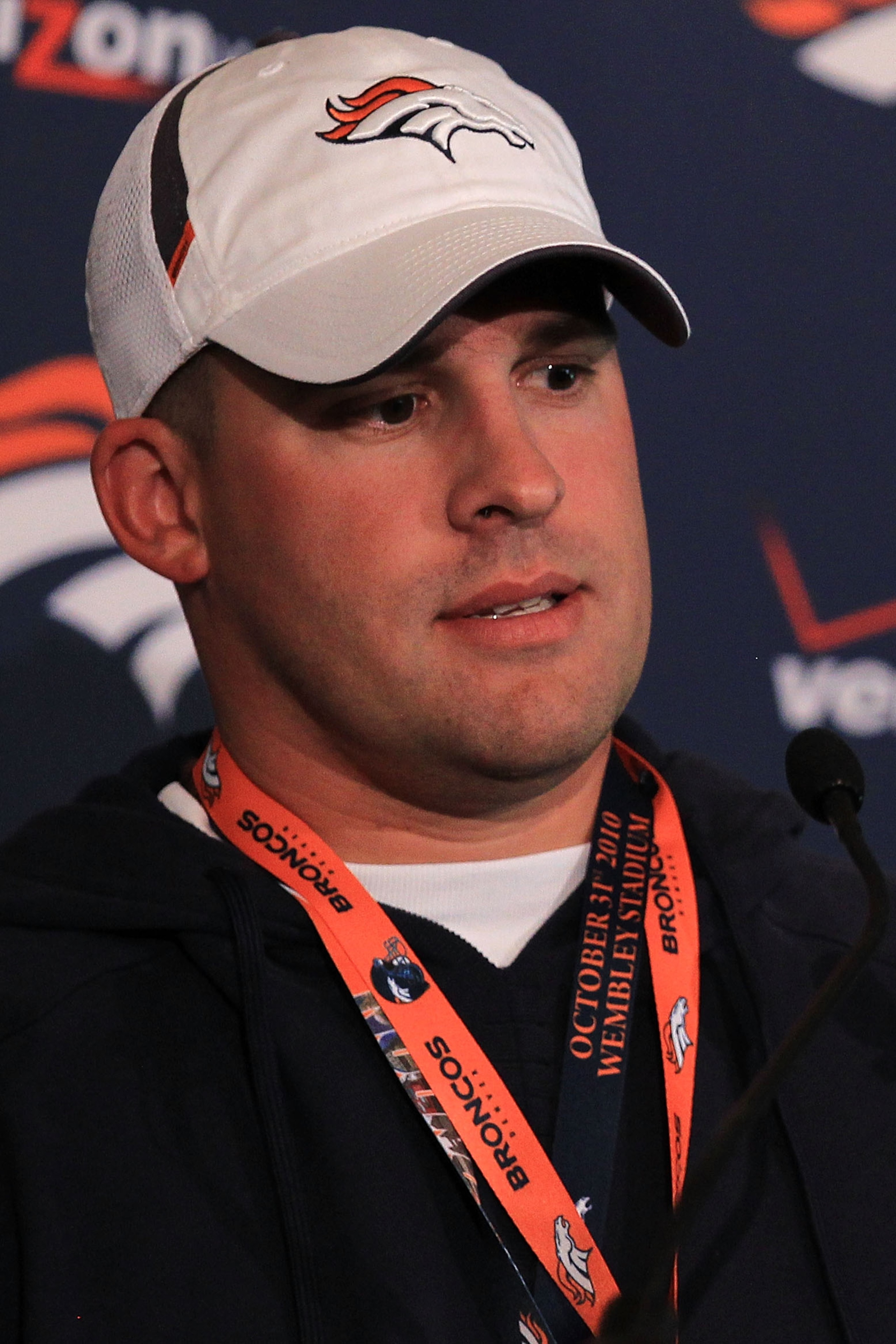 LONDON, ENGLAND - OCTOBER 29: Head coach of the Denver Broncos Josh McDaniels speaks to the media during a press conference prior to the start of a team training session at The Brit Oval on October 29, 2010 in London, England. The Denver Broncos will pla LONDON, ENGLAND - OCTOBER 29: Head coach of the Denver Broncos Josh McDaniels speaks to the media during a press conference prior to the start of a team training session at The Brit Oval on October 29, 2010 in London, England. The Denver Broncos will pla