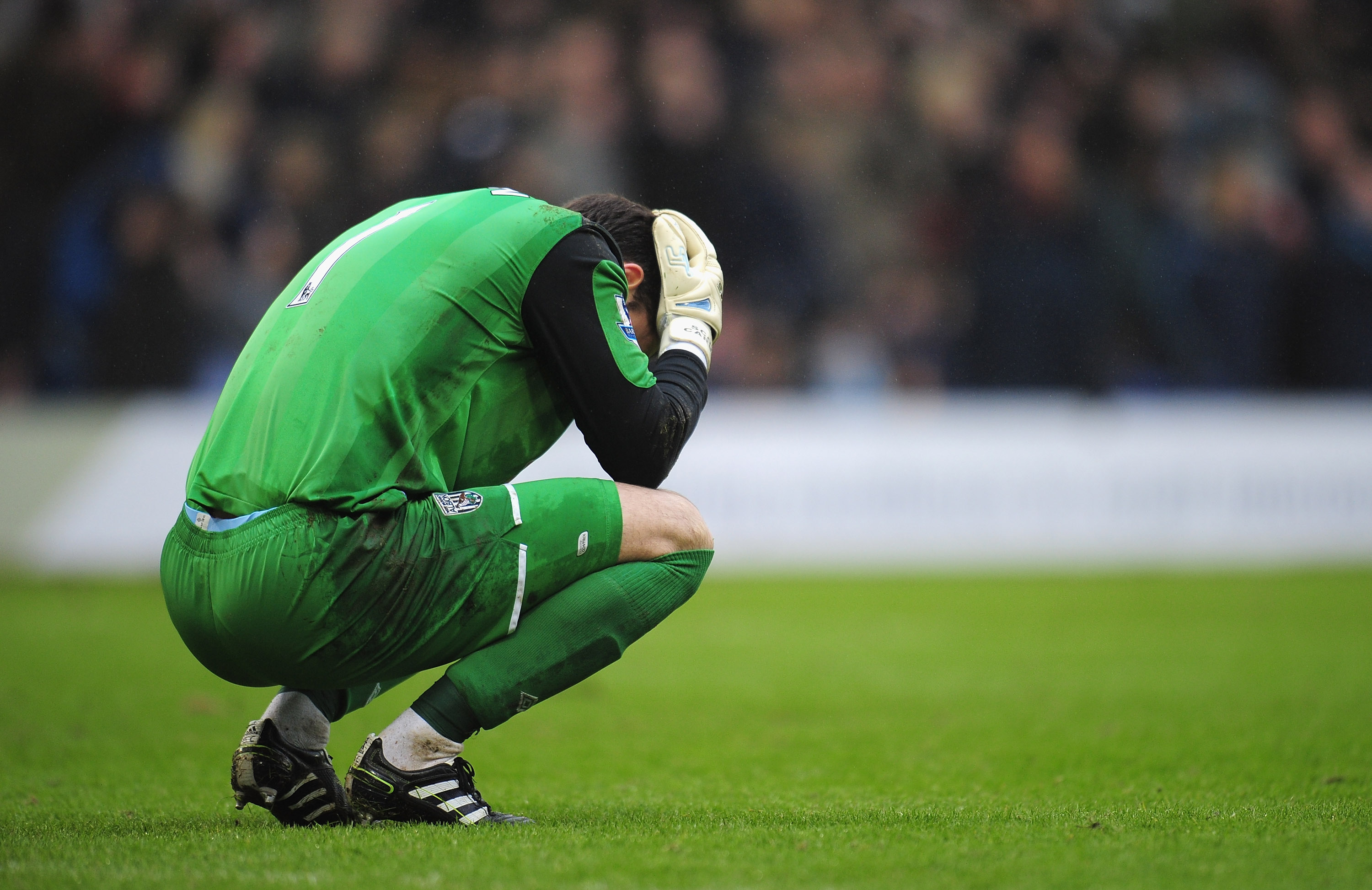 WEST BROMWICH, ENGLAND - JANUARY 01:  Scott Carson of West Bromich Albion holds his head in his hands after his team miss a penalty during the Barclays Premier League match between West Bromich Albion and Manchester United at The Hawthorns on January 1, 2