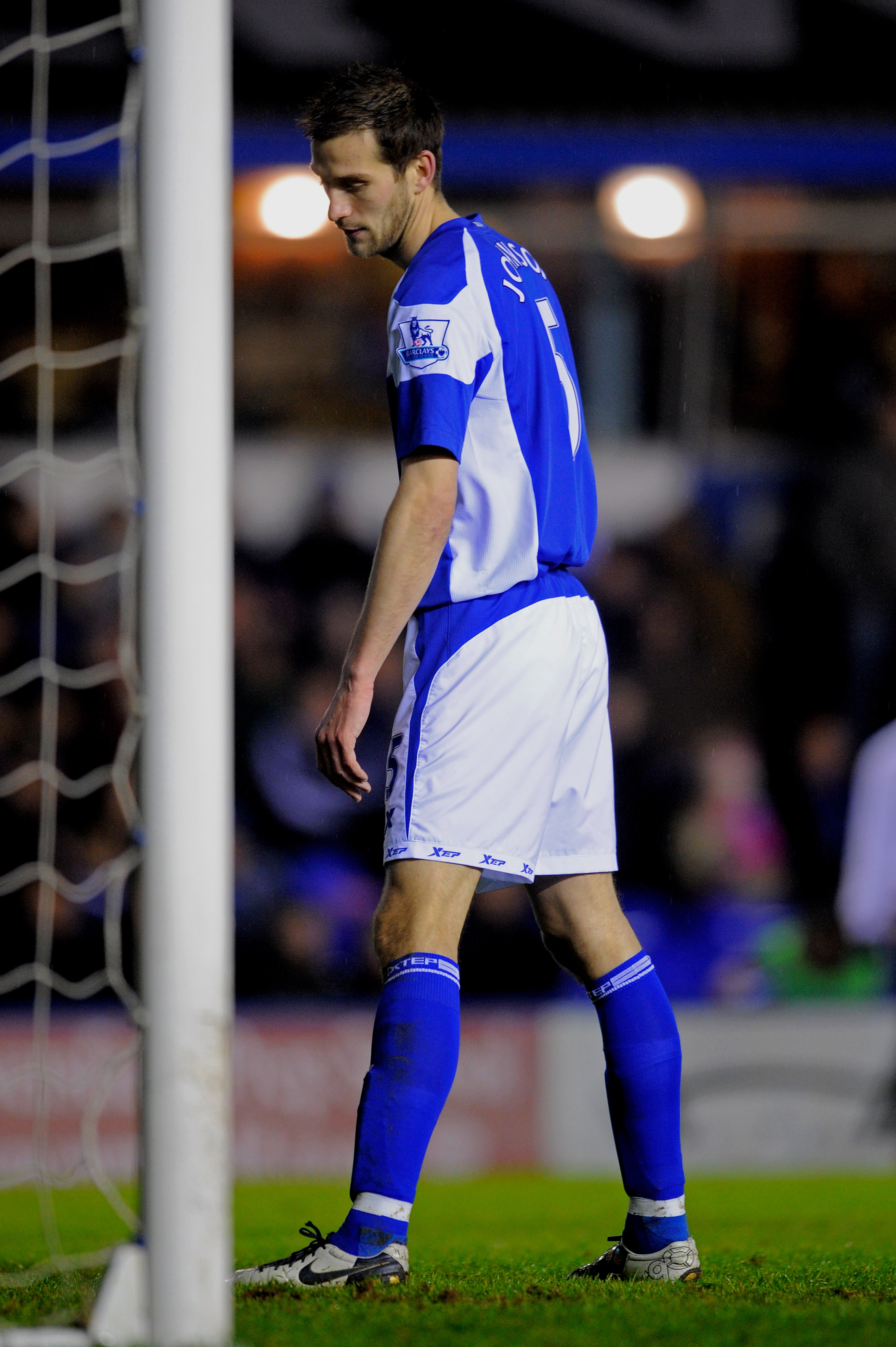 BIRMINGHAM, ENGLAND - JANUARY 01:  A dejected Roger Johnson of Birmingham looks on after scoring an own goal to make the score 3-0 during the Barclays Premier Leaue match between Birmingham City and Arsenal at St. Andrews on January 1, 2011 in Birmingham,