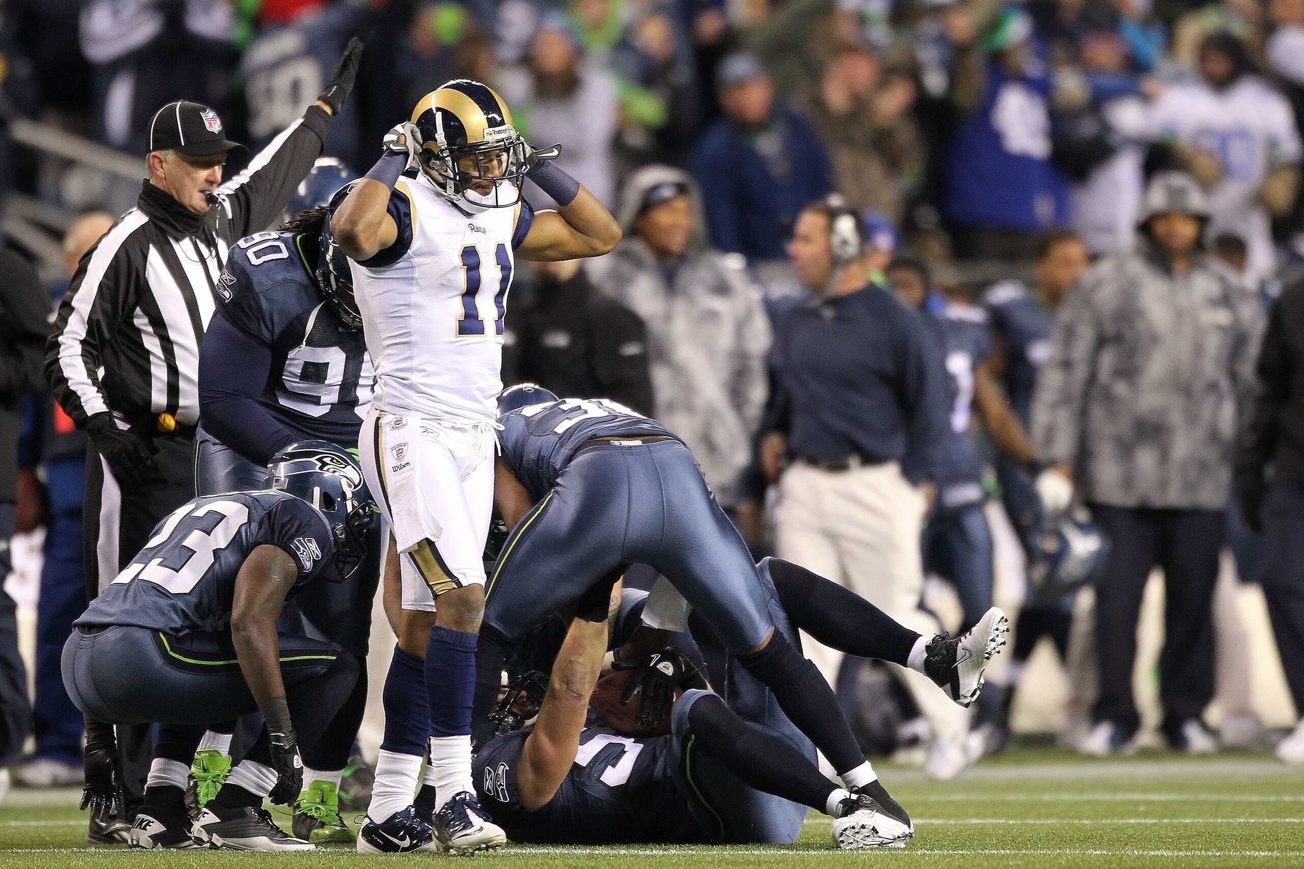 SEATTLE, WA - JANUARY 02:  Wide receiver Brandon Gibson #11 of the St. Louis Rams reacts after the ball was intercepted by Will Herring #54 of the Seattle Seahawks in the fourth quarter of their game at Qwest Field on January 2, 2011 in Seattle, Washingto