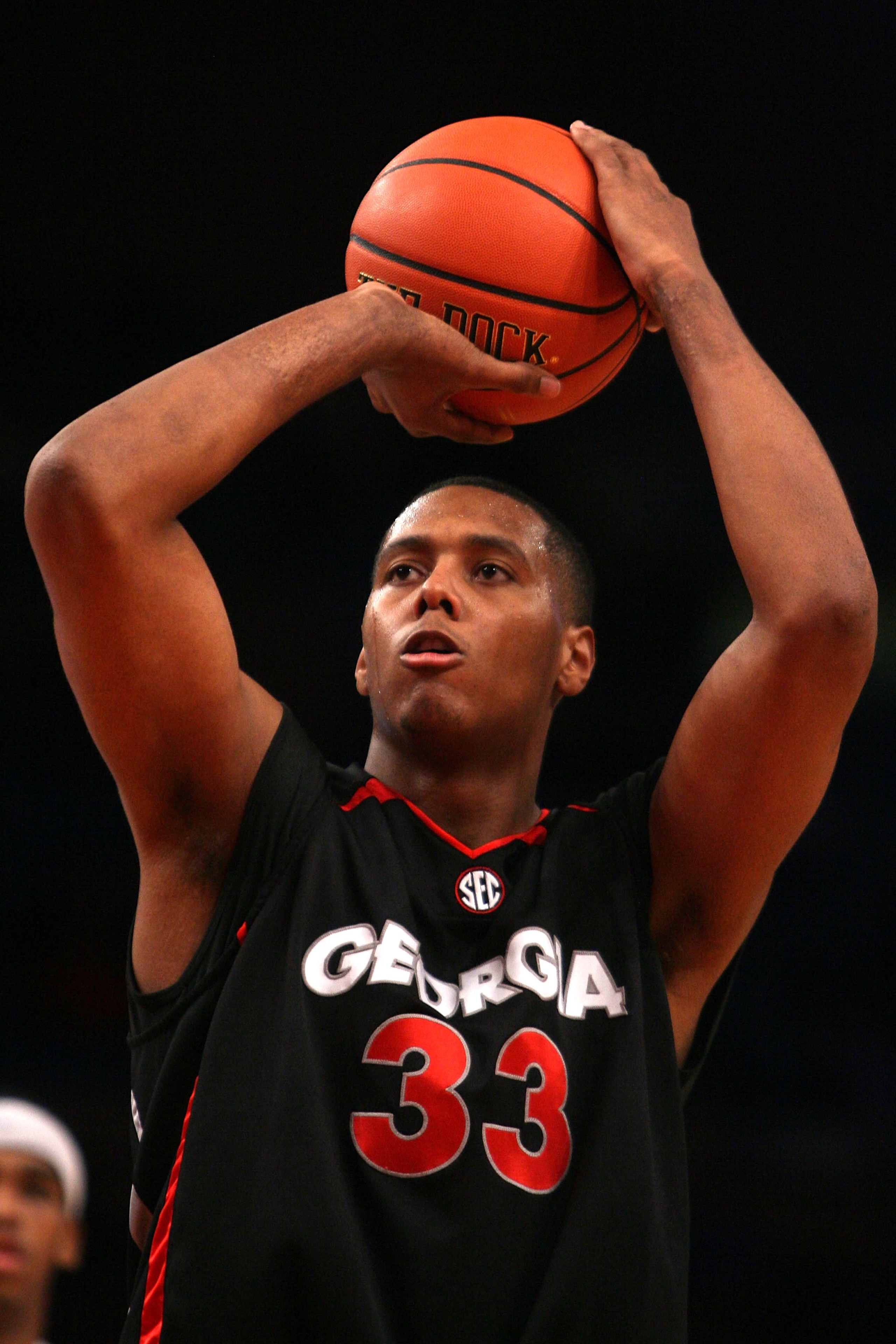 NEW YORK - DECEMBER 09: Trey Thompkins #33 of the Georgia Bulldogs shoots a free throw against the St. John's Red Storm during the SEC Big East Invitational at Madison Square Garden on December 9, 2009 in New York, New York. The Red Storm defeated the Bul