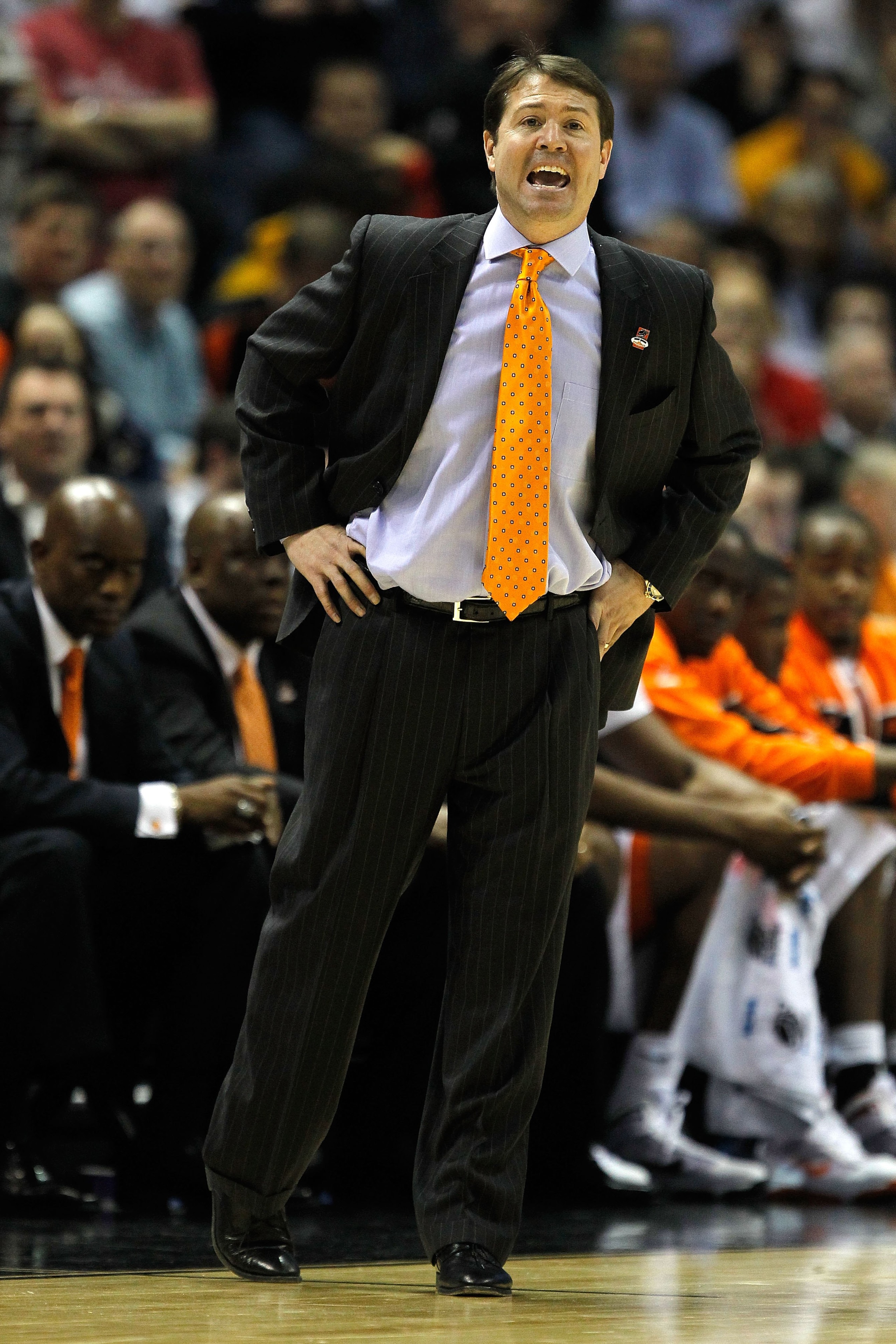 MILWAUKEE - MARCH 19:  Head coach Travis Ford of the Oklahoma State Cowboys looks on while taking on the Georgia Tech Yellow Jackets during the first round of the 2010 NCAA men's basketball tournament at the Bradley Center on March 19, 2010 in Milwaukee,
