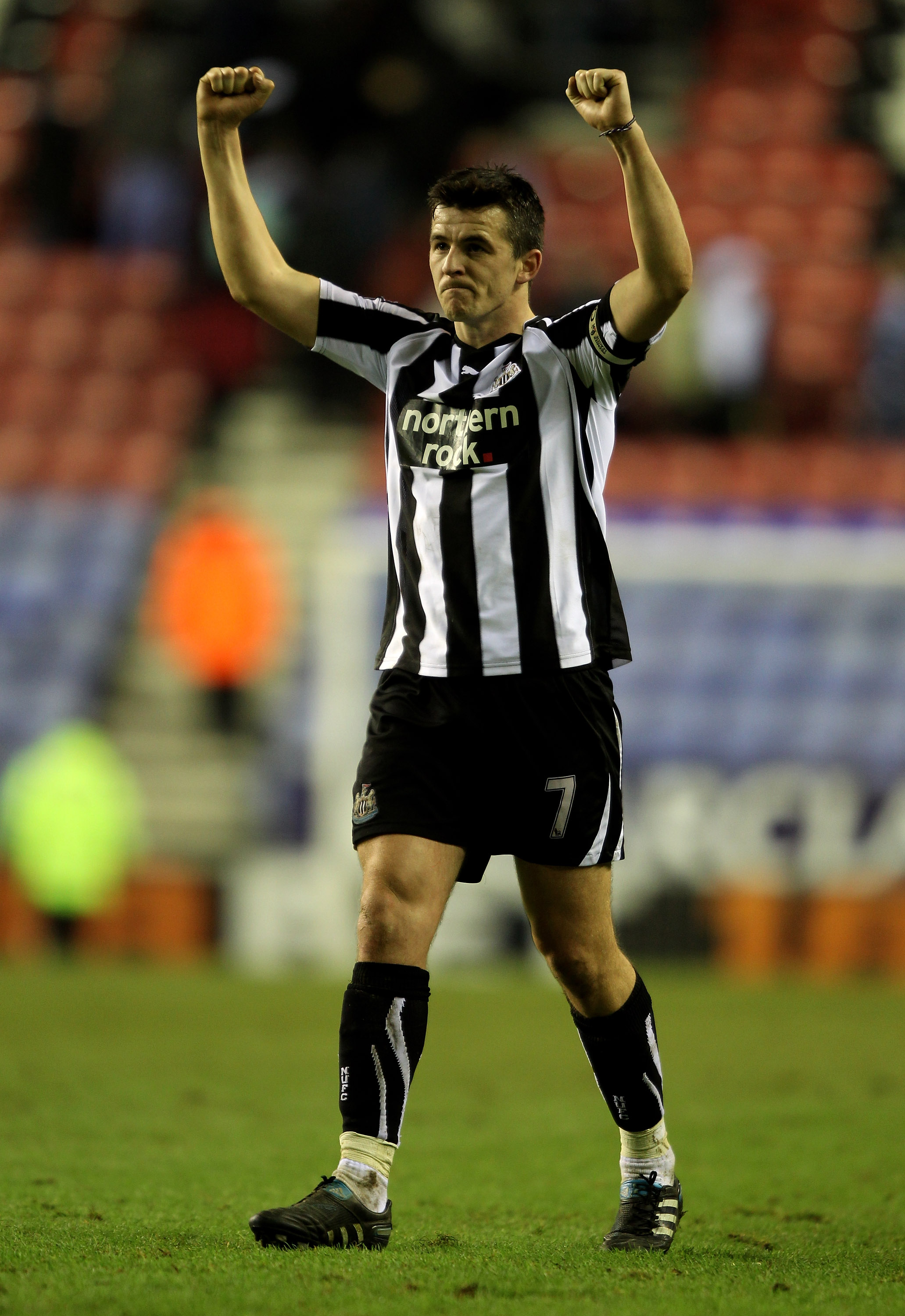 WIGAN, ENGLAND - JANUARY 02:  Joey Barton of Newcastle United celebrates at the end of the Barclays Premier League match between Wigan Athletic and Newcastle United at the DW Stadium on January 2, 2011 in Wigan, England.  (Photo by Clive Brunskill/Getty I