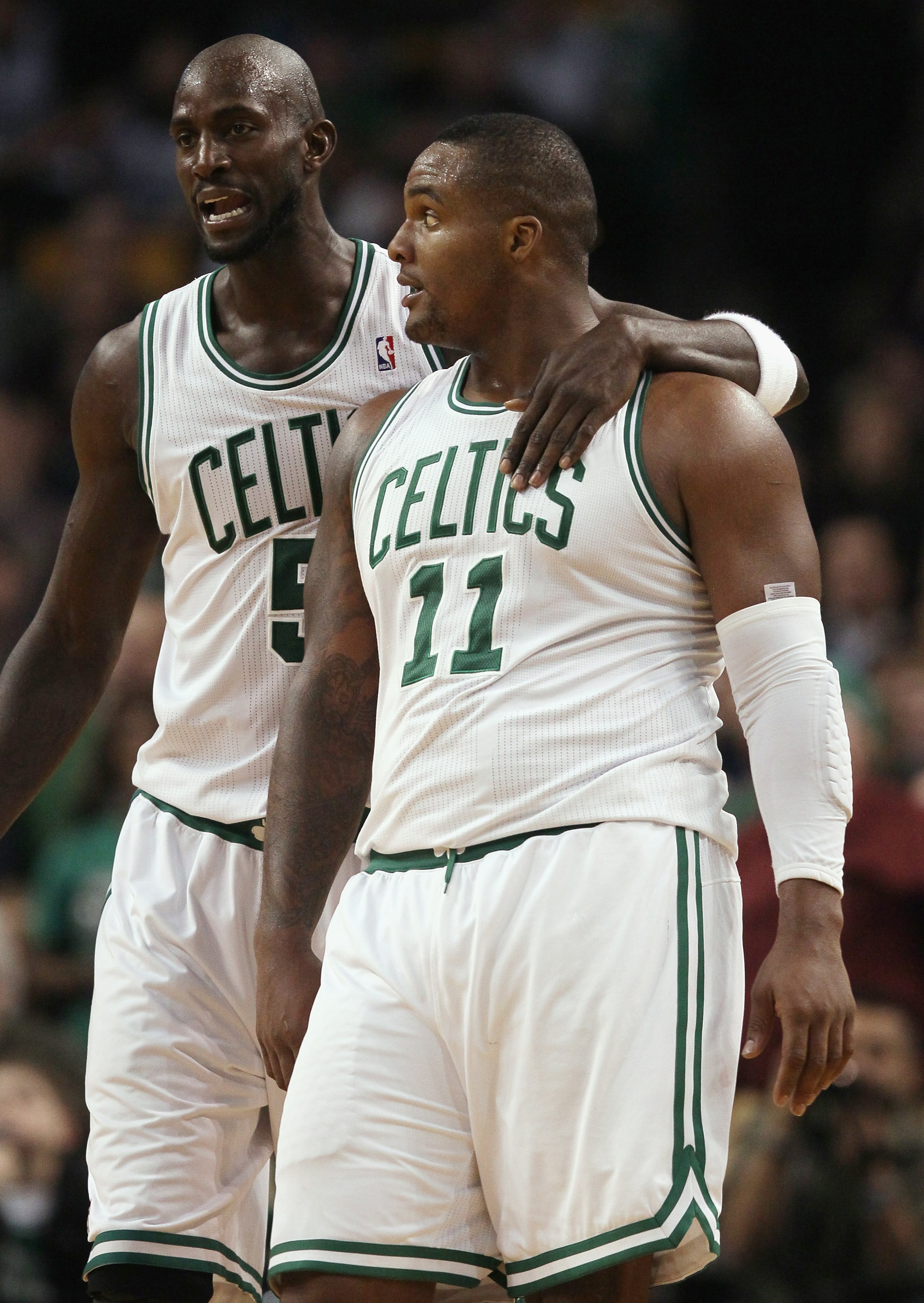 BOSTON, MA - DECEMBER 08:  Kevin Garnett #5 of the Boston Celtics consoles teammate Glen Davis #11 after Davis got in scuffle with Arron Afflalo of the Denver Nuggets on December 8, 2010 at the TD Garden in Boston, Massachusetts. The Celtics defeated the