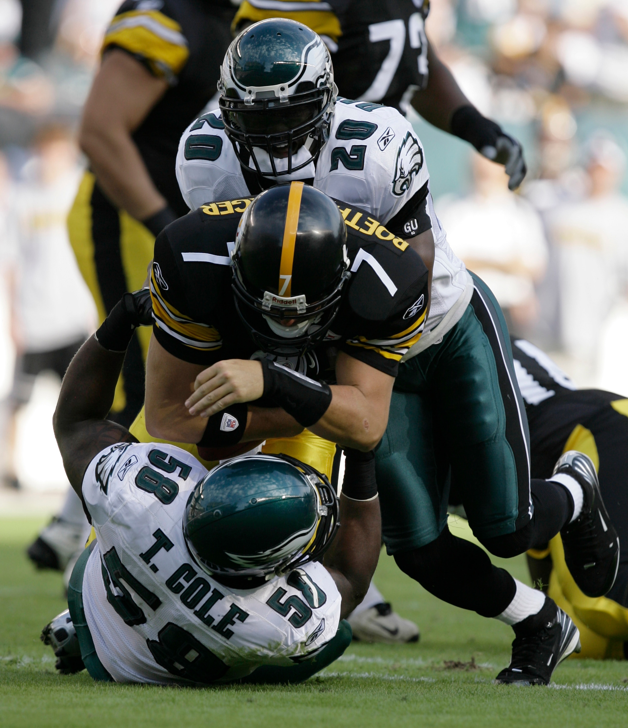 PHILADELPHIA - SEPTEMBER 21: Brian Dawkins #20 of the Philadelphia Eagles and teammate Trent Cole #58 sack Ben Roethlisberger #7 of the Pittsburgh Steelers during the first half on September 21, 2008 at Lincoln Financial Field in Philadelphia, Pennsylvani
