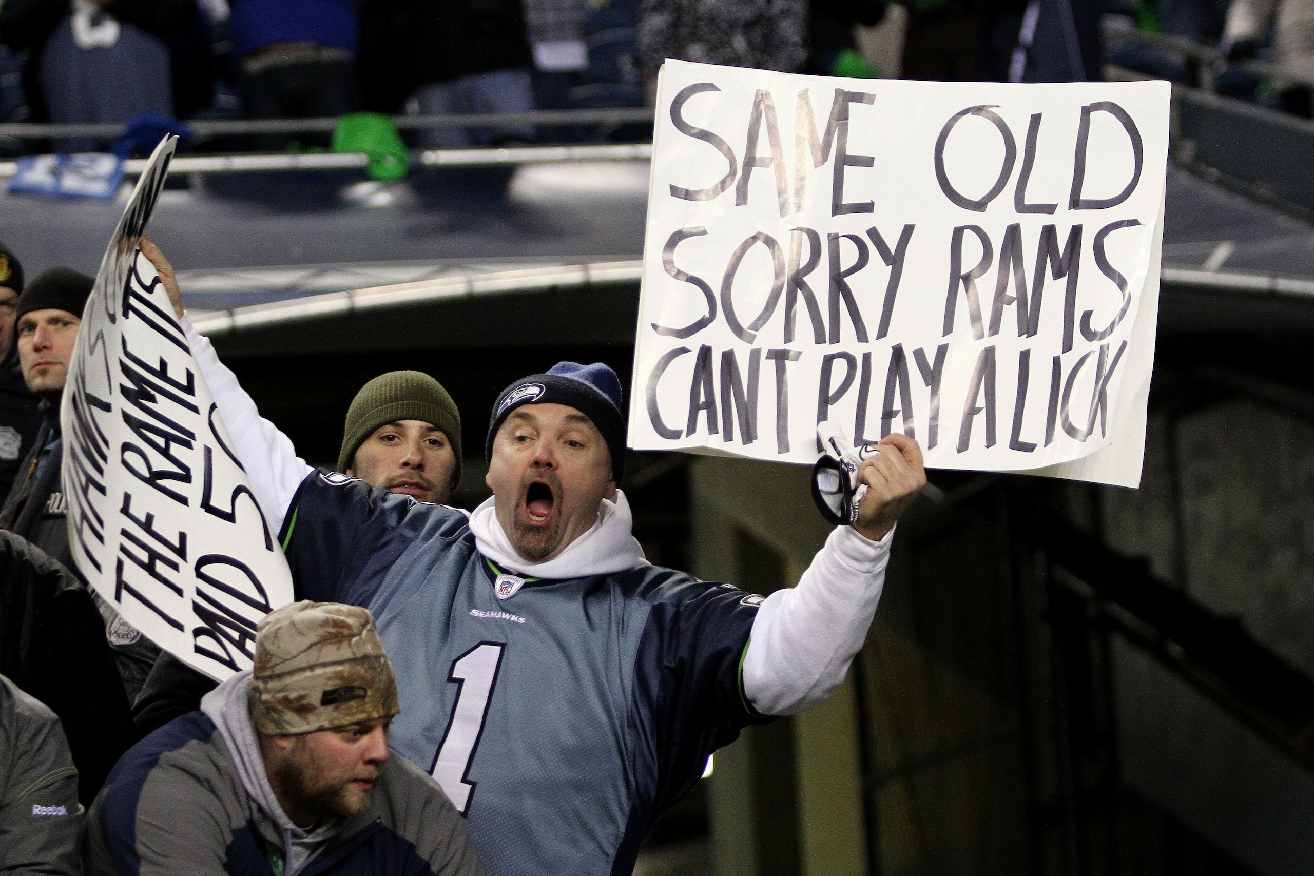 SEATTLE, WA - JANUARY 02: A fan of the Seattle Seahawks holds a sign during their game against the St. Louis Rams at Qwest Field on January 2, 2011 in Seattle, Washington. (Photo by Otto Greule Jr/Getty Images) SEATTLE, WA - JANUARY 02: A fan of the Seattle Seahawks holds a sign during their game against the St. Louis Rams at Qwest Field on January 2, 2011 in Seattle, Washington. (Photo by Otto Greule Jr/Getty Images)