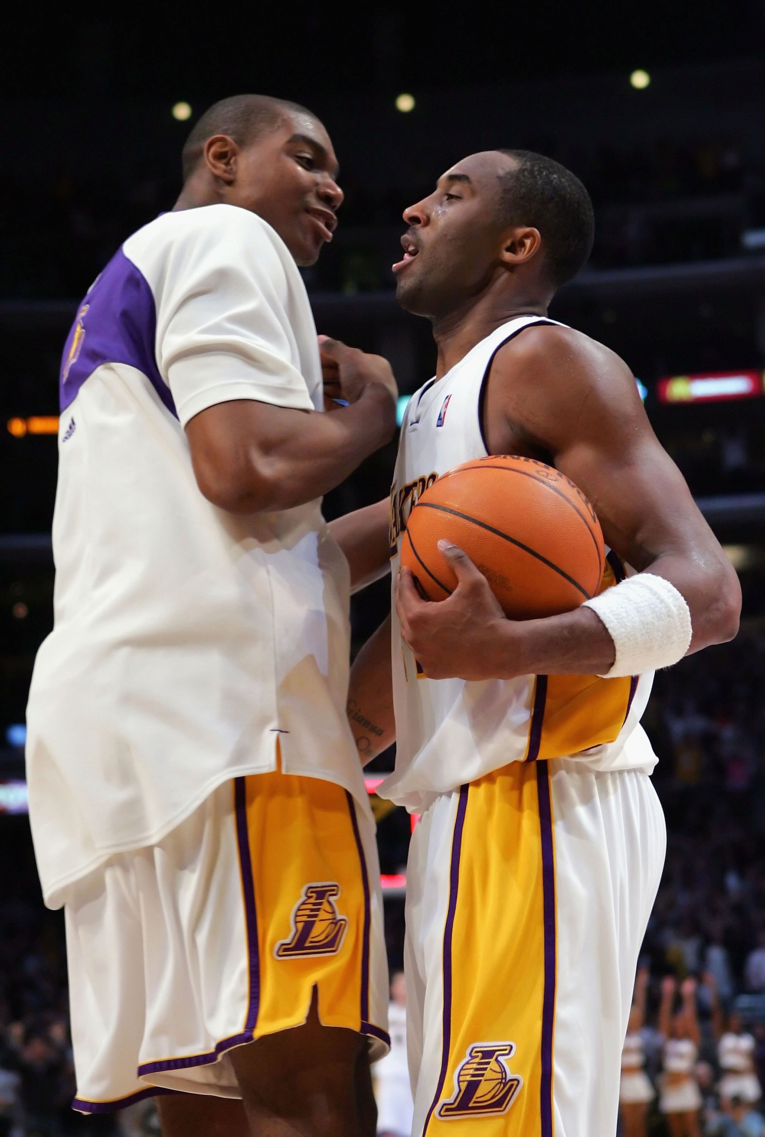 LOS ANGELES - JANUARY 7:  Andrew Bynum #17 and teammate Kobe Bryant #24 of the Los Angeles Lakers celebrate after defeating the Dallas Mavericks 101-98 on January 7, 2007 at Staples Center in Los Angeles, California. NOTE TO USER: User expressly acknowled