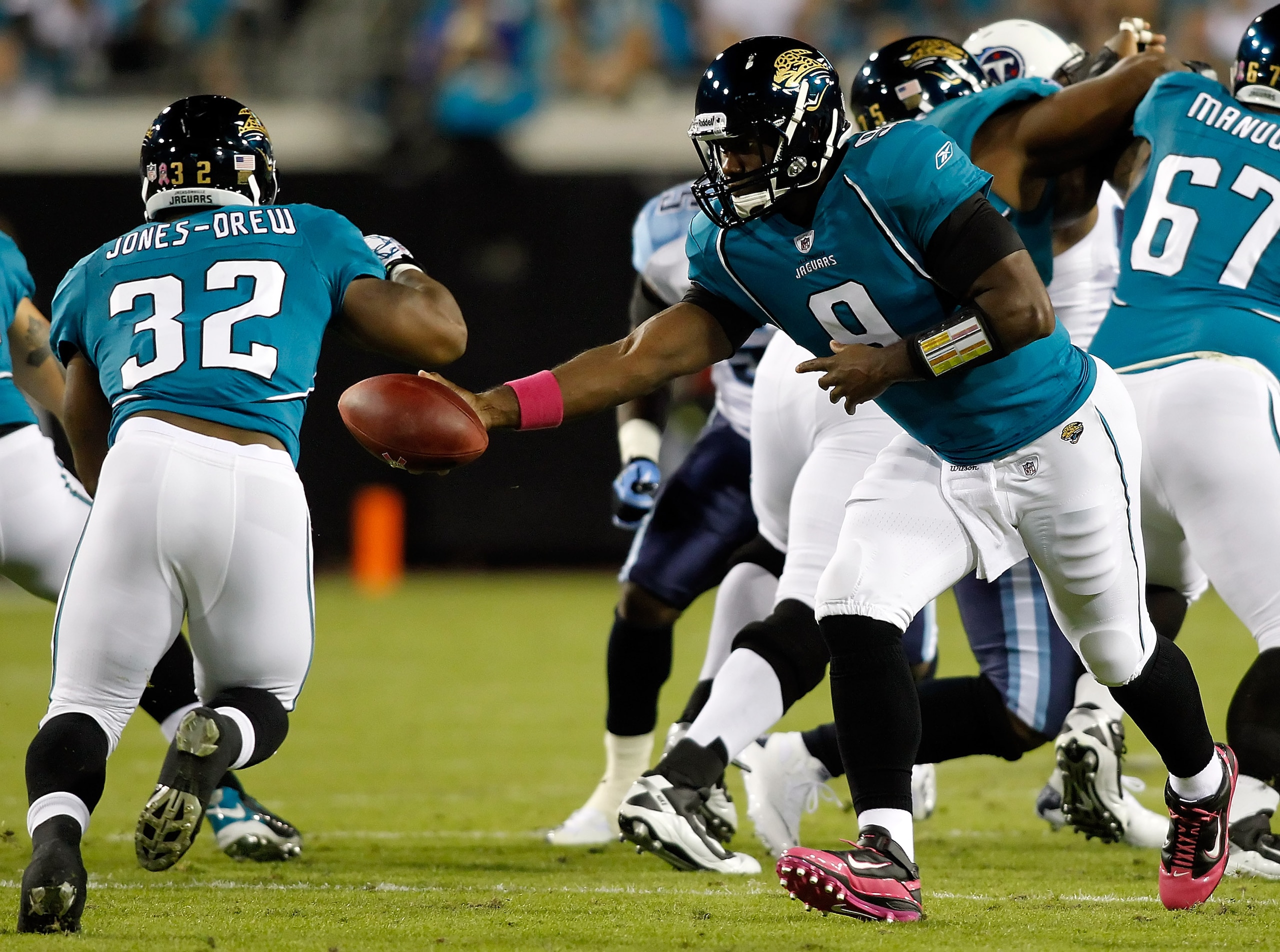 JACKSONVILLE, FL - OCTOBER 18: Quarterback David Garrard #9 of the Jacksonville Jaguars hands the ball off to running back Maurice Jones-Drew #32 against the Tennessee Titans during the game at EverBank Field on October 18, 2010 in Jacksonville, Florida. JACKSONVILLE, FL - OCTOBER 18: Quarterback David Garrard #9 of the Jacksonville Jaguars hands the ball off to running back Maurice Jones-Drew #32 against the Tennessee Titans during the game at EverBank Field on October 18, 2010 in Jacksonville, Florida.