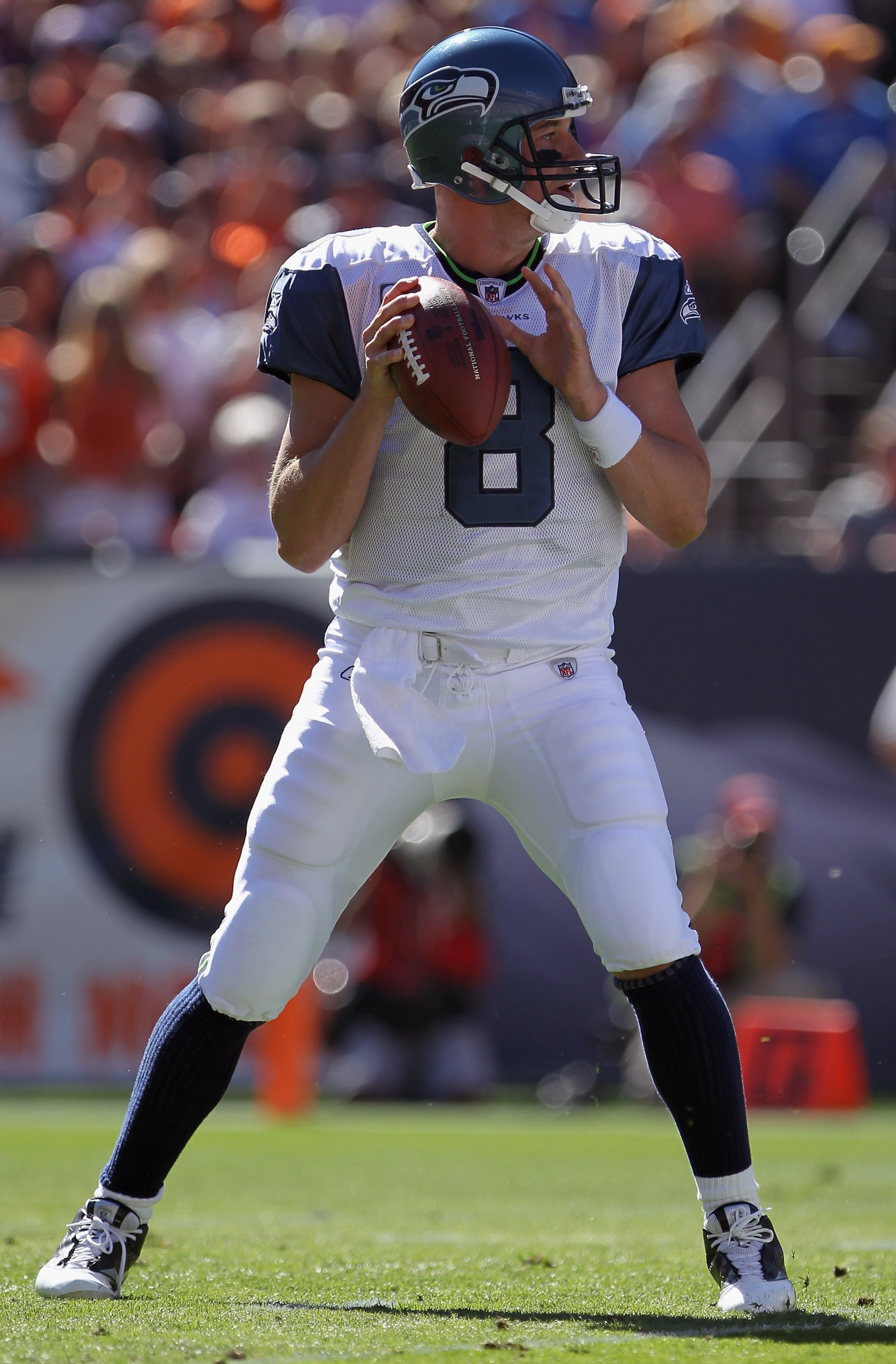 DENVER - SEPTEMBER 19: Quarterback Matt Hasselbeck #8 of the Seattle Seahawks delivers a pass against the Denver Broncos at INVESCO Field at Mile High on September 19, 2010 in Denver, Colorado. The Broncos defeated the Seahawks 31-14. (Photo by Doug Pen DENVER - SEPTEMBER 19: Quarterback Matt Hasselbeck #8 of the Seattle Seahawks delivers a pass against the Denver Broncos at INVESCO Field at Mile High on September 19, 2010 in Denver, Colorado. The Broncos defeated the Seahawks 31-14. (Photo by Doug Pen