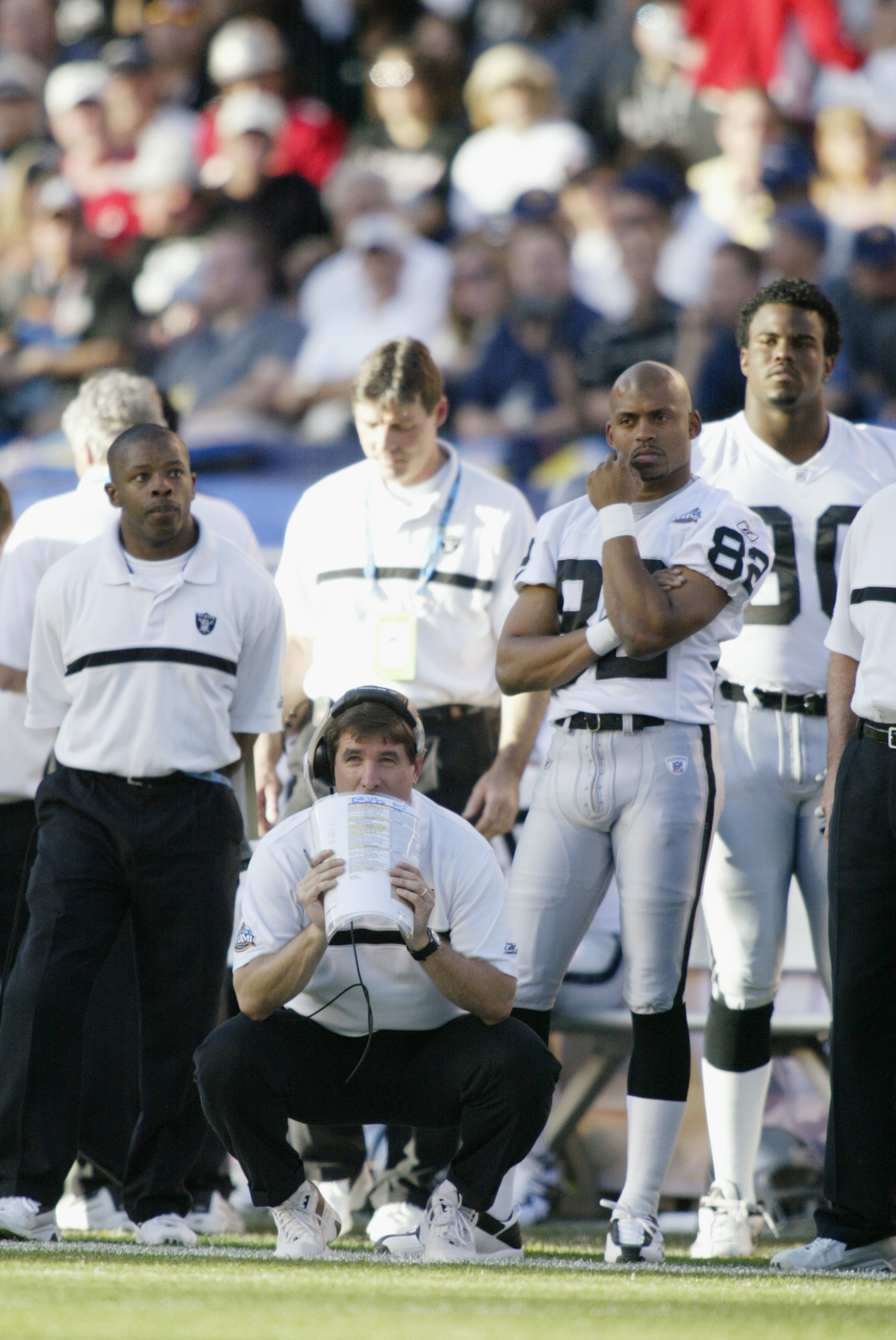SAN DIEGO - JANUARY 26:  Head coach Bill Callahan and wide receiver James Jett #82 of the Oakland Raiders watch the game against the Tampa Bay Buccaneers during Super Bowl XXXVII at Qualcomm Stadium on January 26, 2003 in San Diego, California.  The Bucca