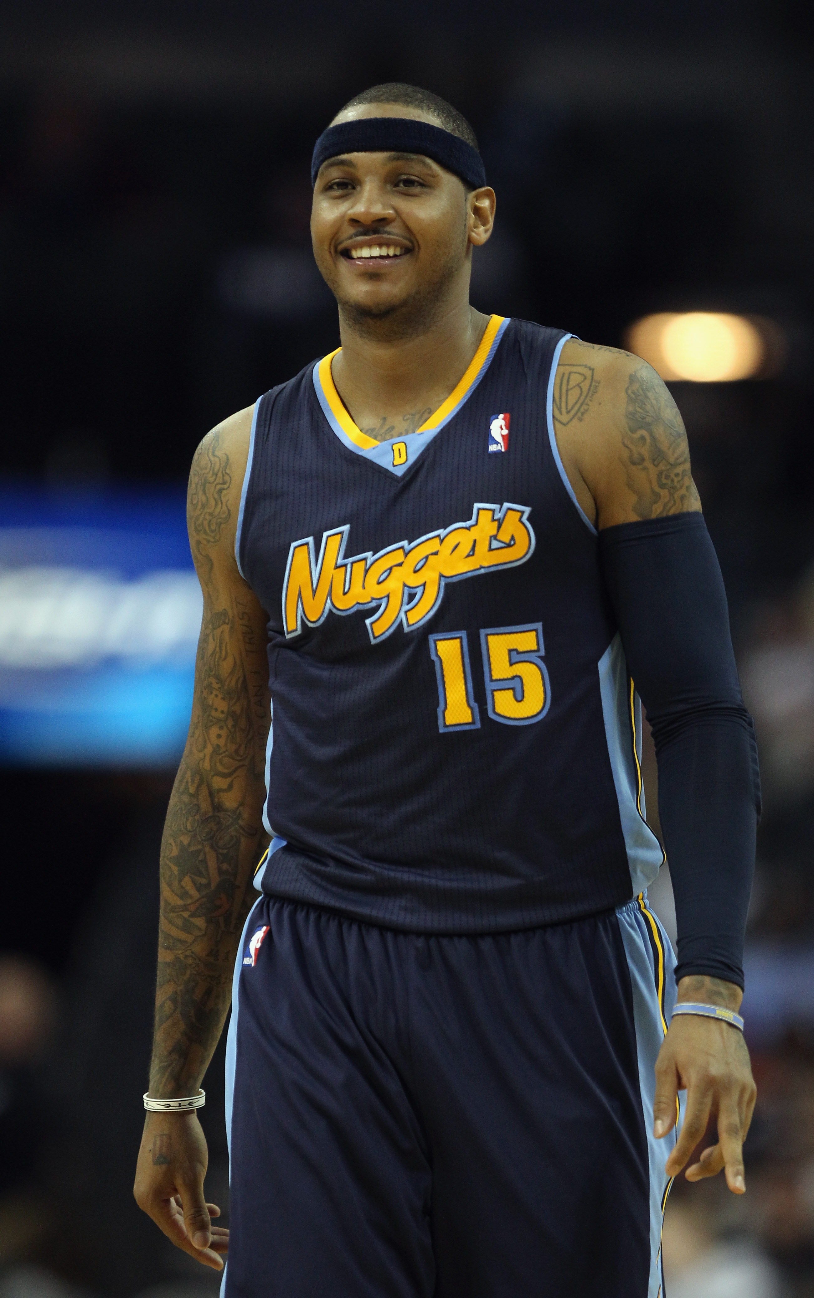 Denver Nuggets rookie forward Carmelo Anthony, front, struggles to