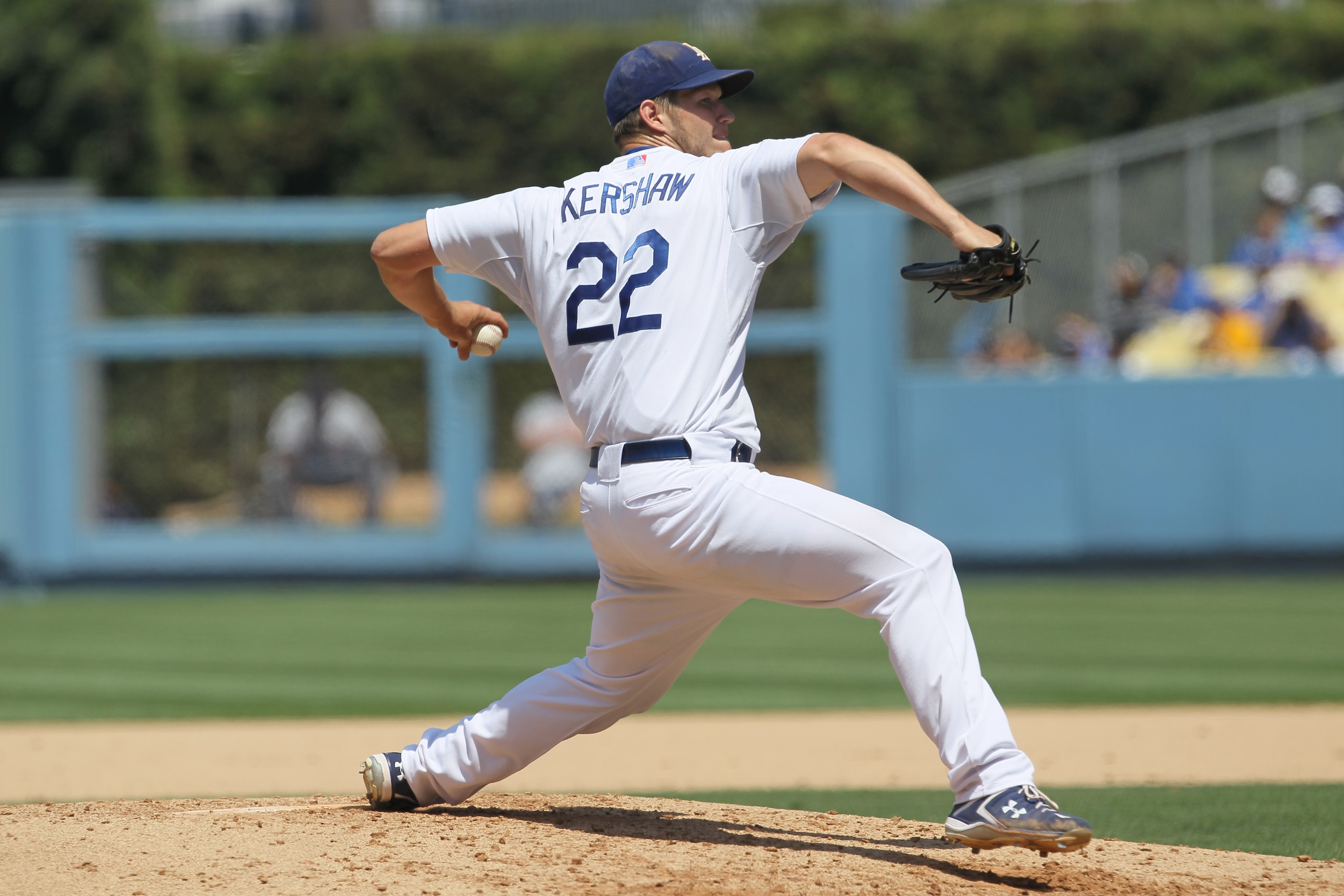 LOS ANGELES, CA - JULY 25:  Pitcher Clayton Kershaw #22 of the Los Angeles Dodgers throws a pitch against the New York Mets on July 25, 2010 at Dodger Stadium in Los Angeles, California.   The Dodgers won 1-0.  (Photo by Stephen Dunn/Getty Images)
