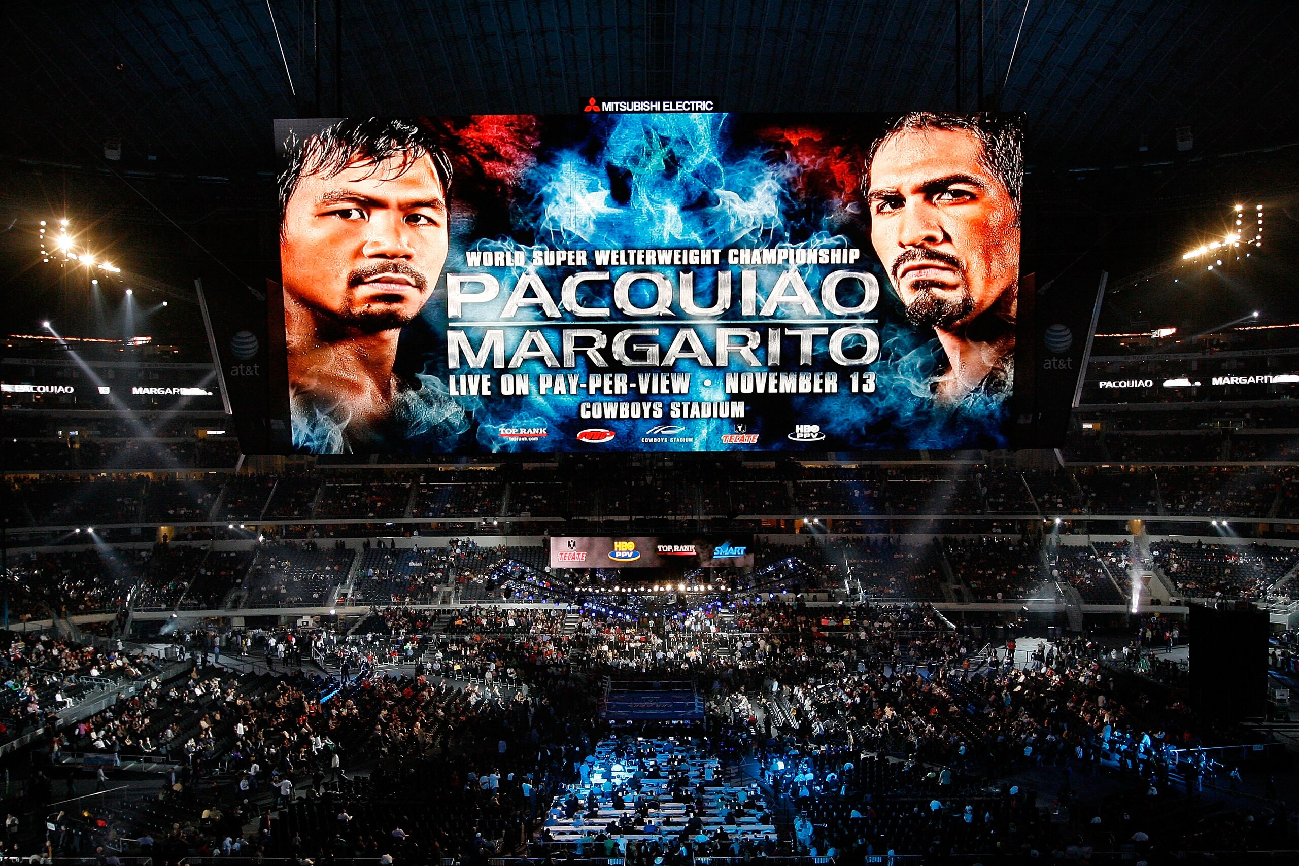 ARLINGTON, TX - NOVEMBER 13:  The giant video screen displays the main event title bout match up between Manny Pacquiao (L) of the Philippines and Antonio Margarito of Mexico prior to their WBC World Super Welterweight Title bout at Cowboys Stadium on Nov