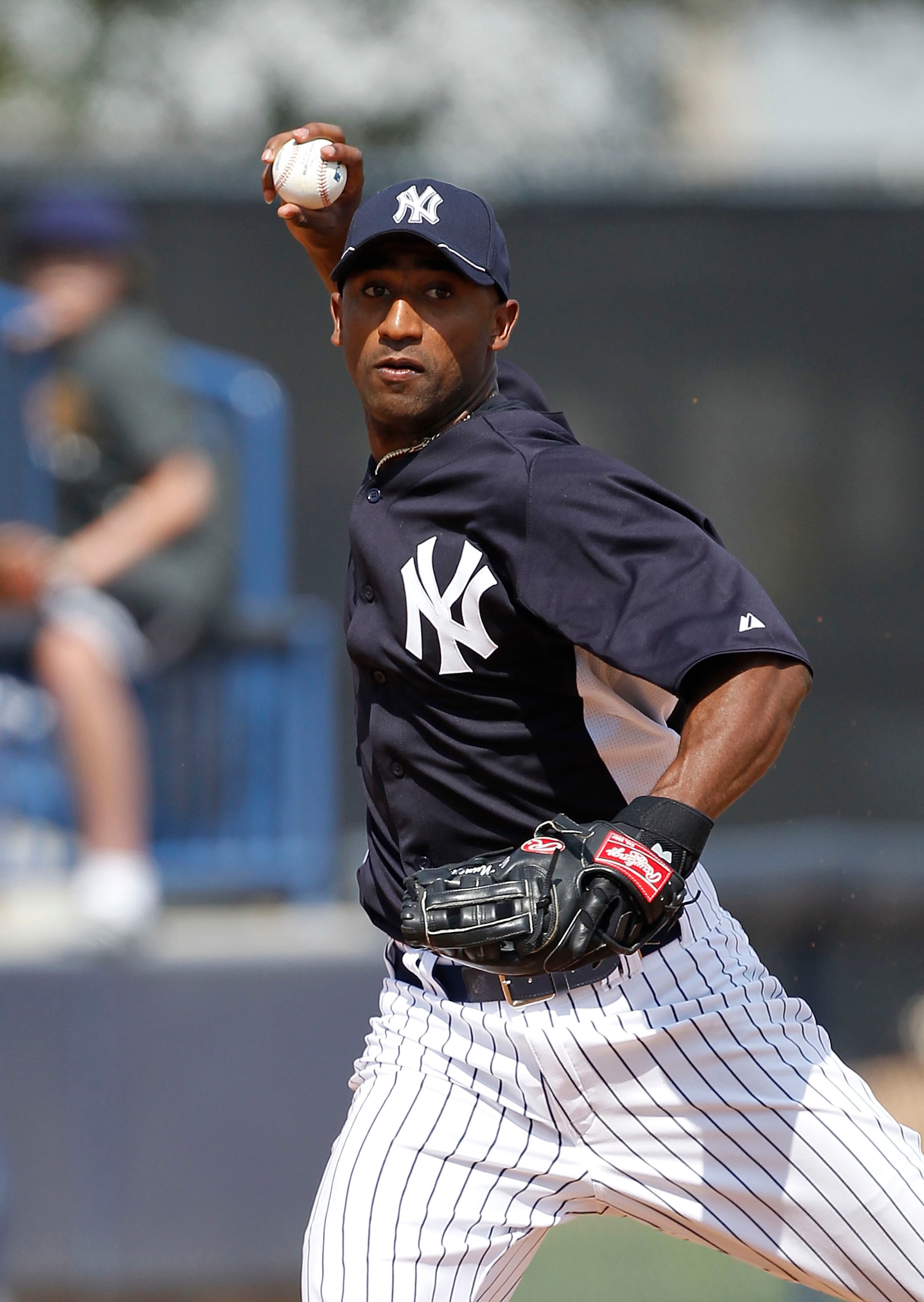 TAMPA, FL - FEBRUARY 20:  Eduardo Nunez #67 of the New York Yankees fields ground balls during the first full team workout of Spring Training on February 20, 2011 at the George M. Steinbrenner Field in Tampa, Florida.  (Photo by Leon Halip/Getty Images)