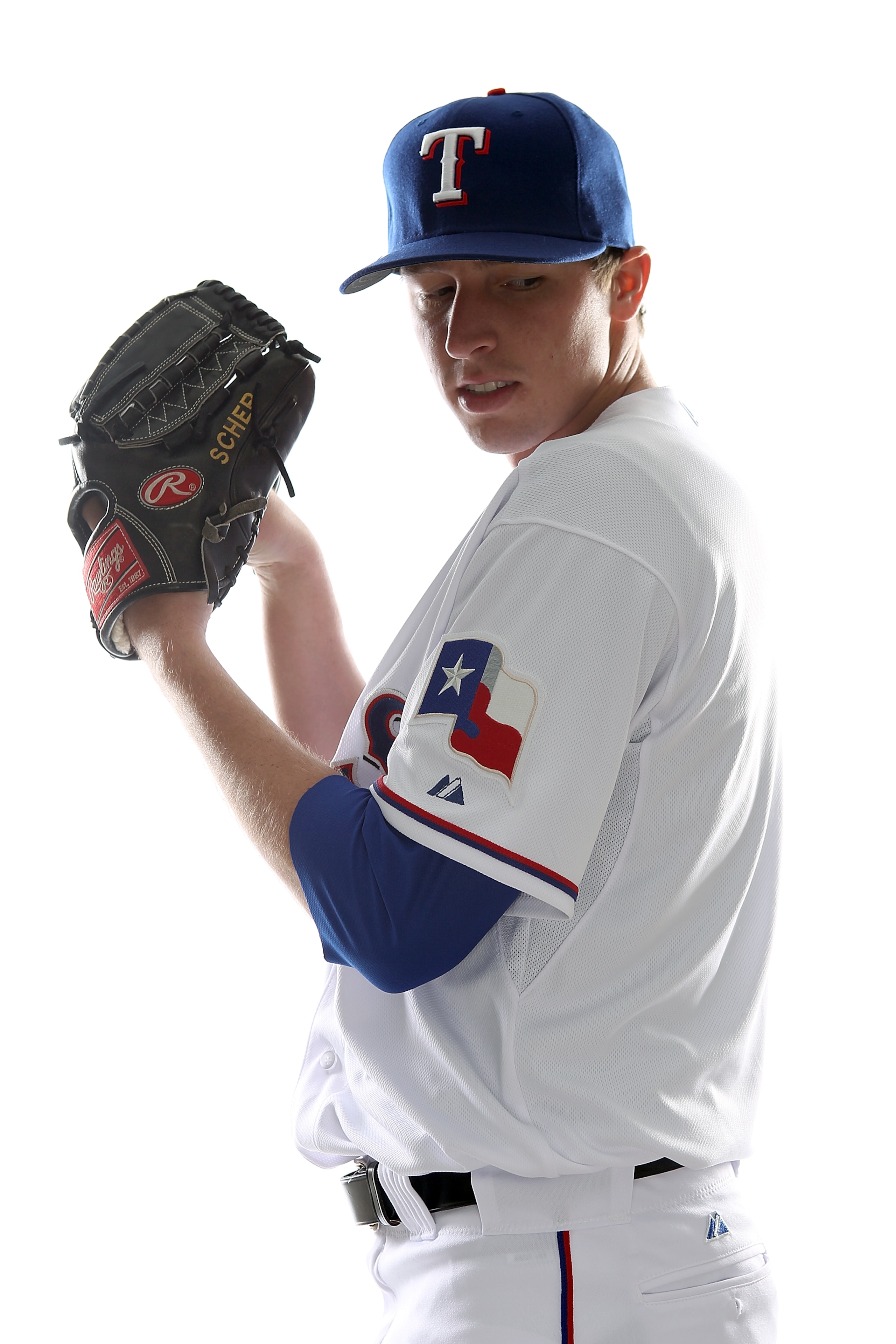 SURPRISE, AZ - FEBRUARY 25:  Tanner Scheppers #52 of the Texas Rangers poses for a portrait during Spring Training Media Day on February 25, 2011 at Surprise Stadium in Surprise, Arizona.  (Photo by Jonathan Ferrey/Getty Images)