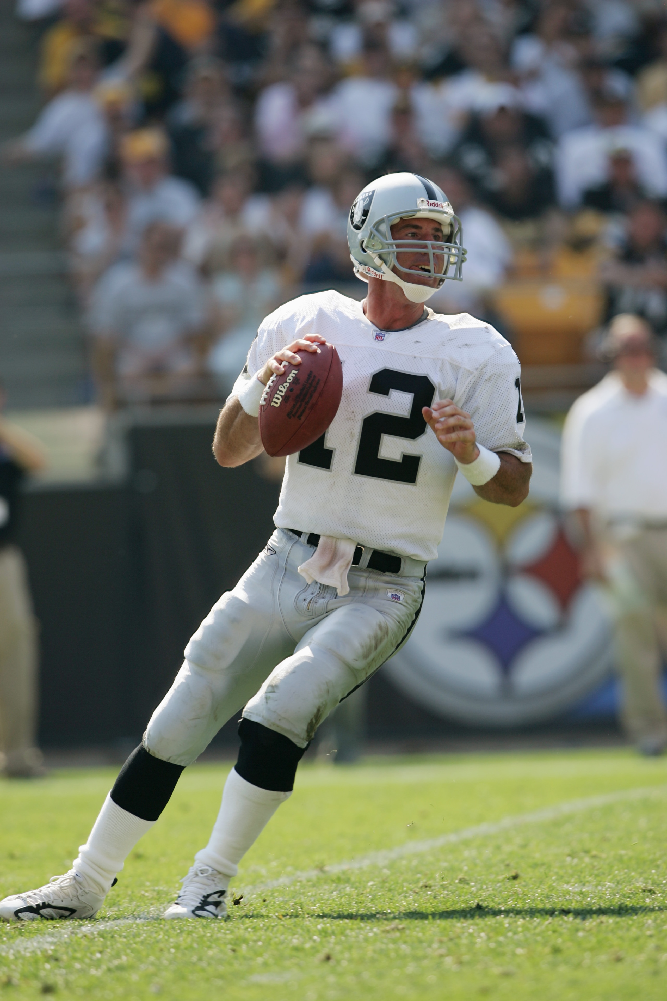 PITTSBURGH - SEPTEMBER 12: Quarterback Rich Gannon #12 of the Oakland Raiders drops back to pass against the Pittsburgh Steelers during the game at Heinz Field on September 12, 2004 in Pittsburgh, Pennsylvania. The Steelers defeated the Raiders 24-21. (P PITTSBURGH - SEPTEMBER 12: Quarterback Rich Gannon #12 of the Oakland Raiders drops back to pass against the Pittsburgh Steelers during the game at Heinz Field on September 12, 2004 in Pittsburgh, Pennsylvania. The Steelers defeated the Raiders 24-21. (P