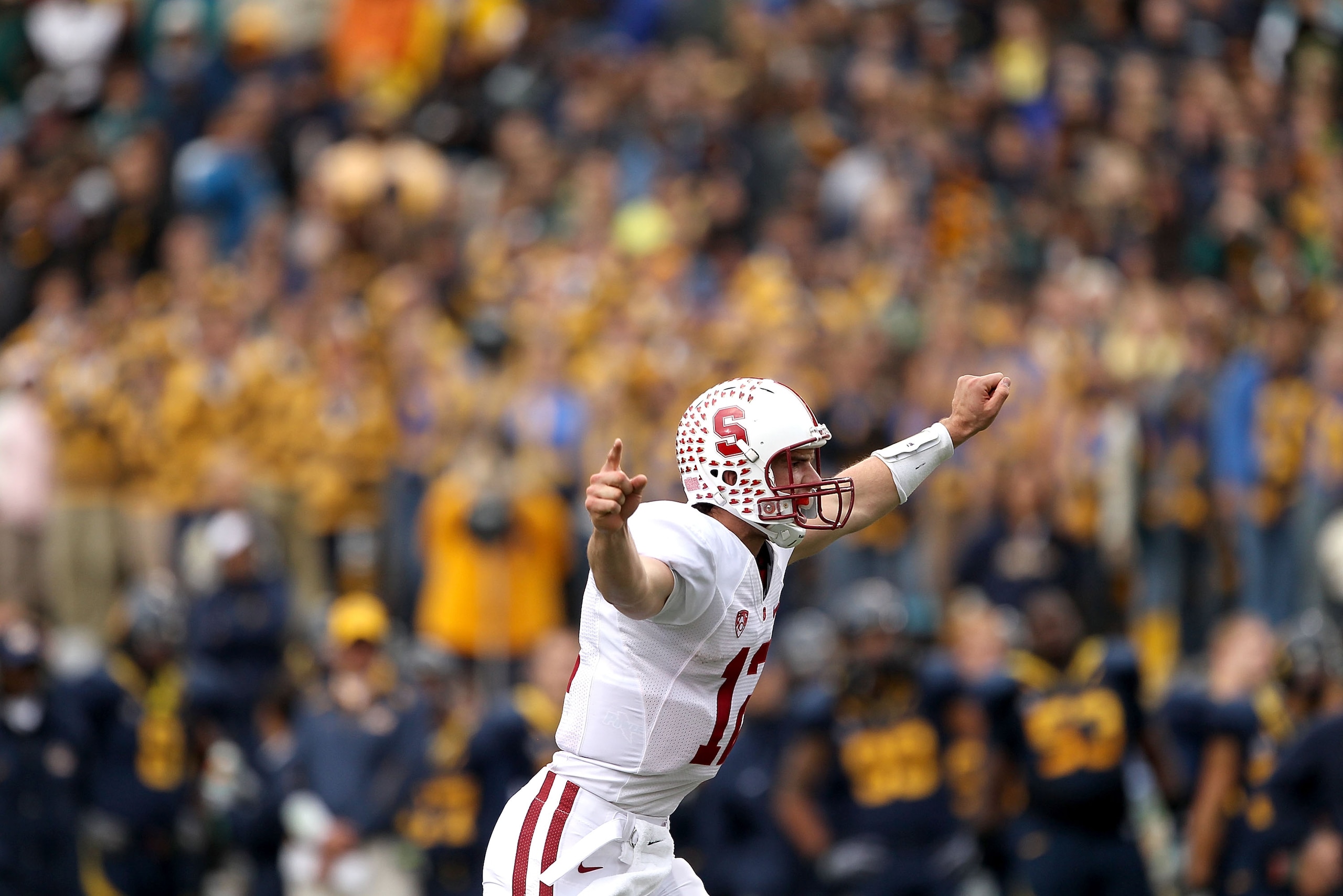 BERKELEY, CA - NOVEMBER 20:  Andrew Luck #12 of the Stanford Cardinal celebrates after the Cardinal scored a touchdown against the California Golden Bears at California Memorial Stadium on November 20, 2010 in Berkeley, California.  (Photo by Ezra Shaw/Ge