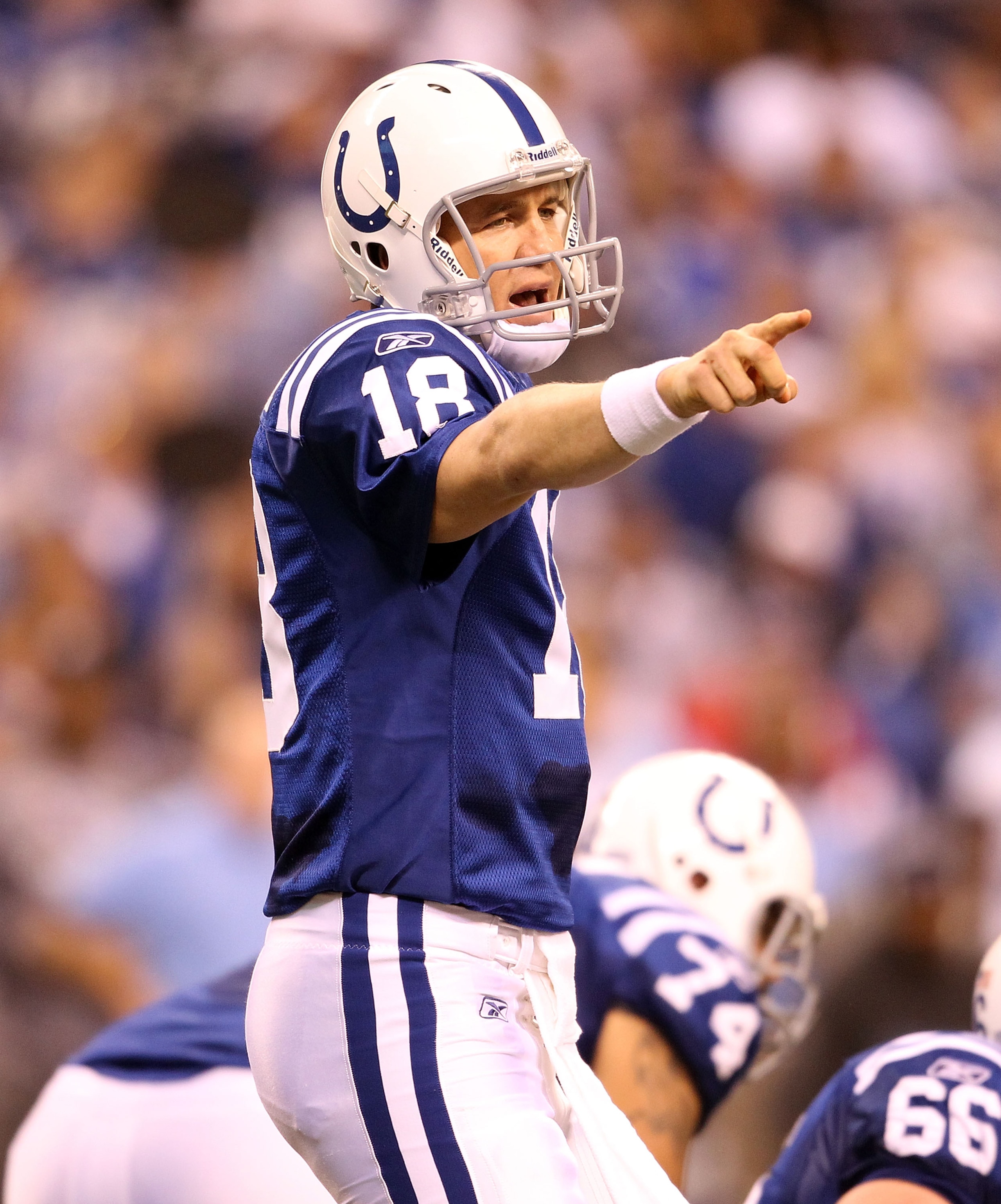 INDIANAPOLIS - JANUARY 02:  Peyton Manning #18 of the Indianapolis Colts gives instructions to his team during NFL game against the Tennessee Titans at Lucas Oil Stadium on January 2, 2011 in Indianapolis, Indiana.  (Photo by Andy Lyons/Getty Images)