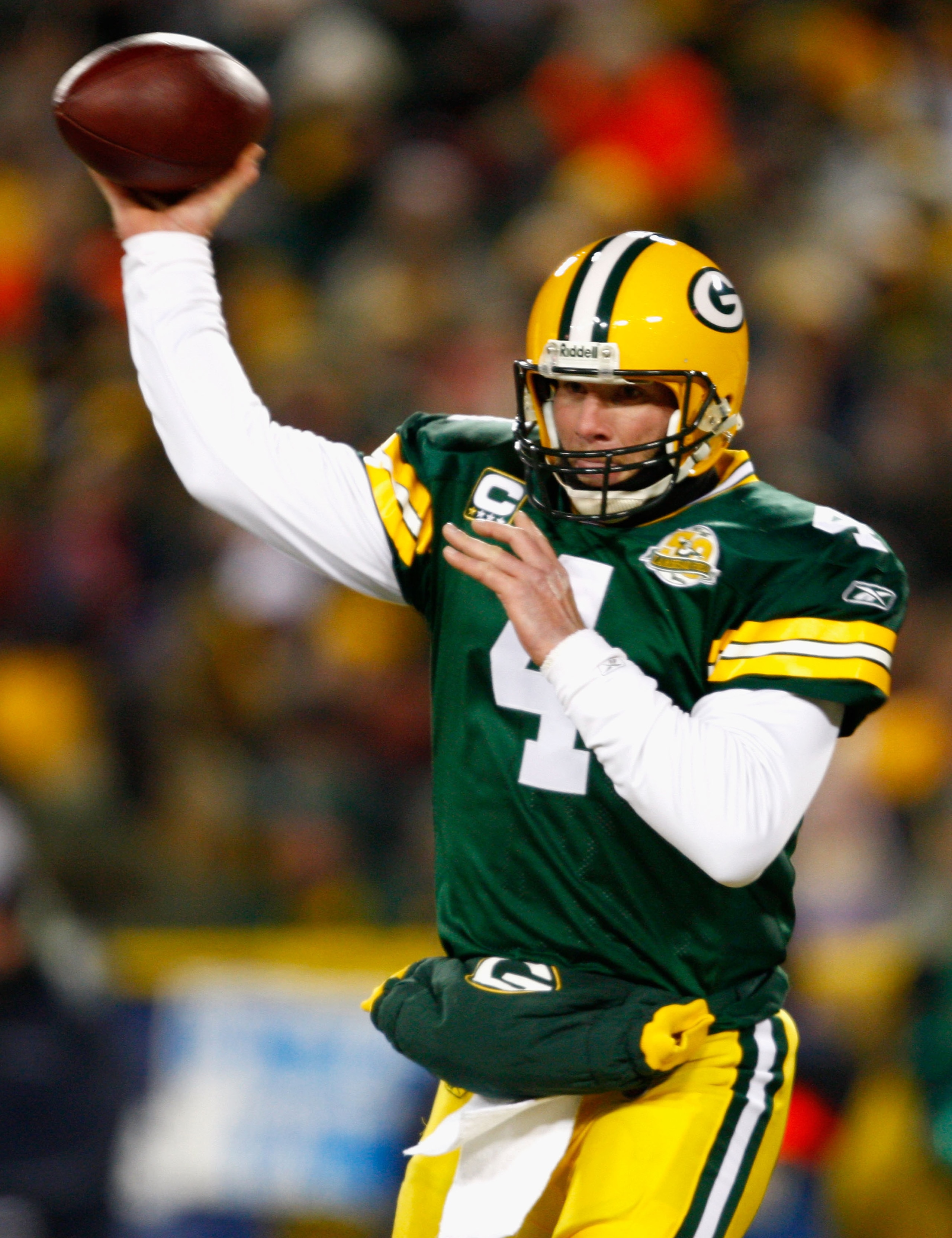 GREEN BAY, WI - JANUARY 20: Quarterback Brett Favre #4 of the Green Bay Packers throws a pass against the New York Giants during the NFC championship game on January 20, 2008 at Lambeau Field in Green Bay, Wisconsin. (Photo by Jamie Squire/Getty Images) GREEN BAY, WI - JANUARY 20: Quarterback Brett Favre #4 of the Green Bay Packers throws a pass against the New York Giants during the NFC championship game on January 20, 2008 at Lambeau Field in Green Bay, Wisconsin. (Photo by Jamie Squire/Getty Images)