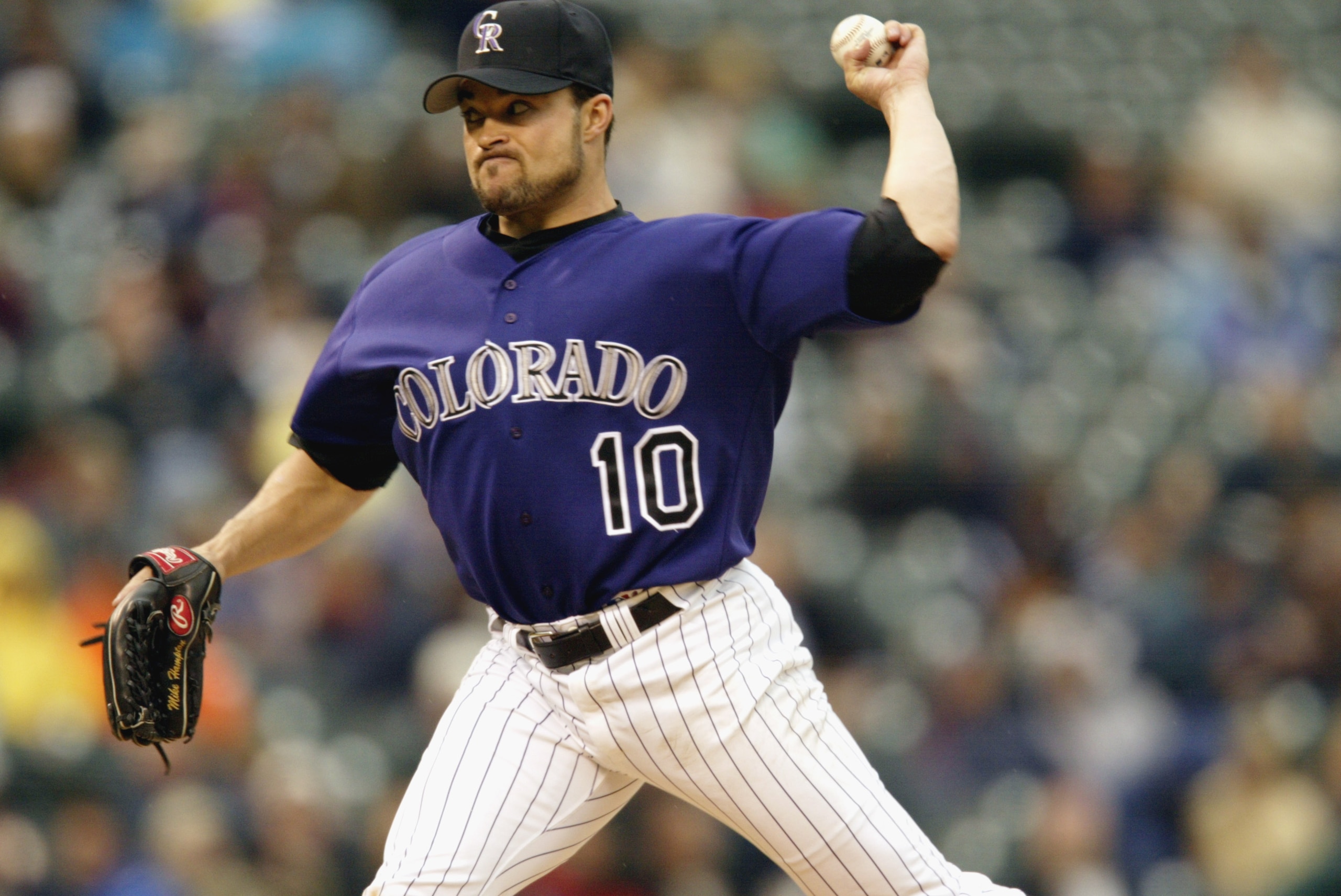 DENVER - MAY 16:  Pitcher Mike Hampton #10 of the Colorado Rockies throws a pitch during the MLB game against the Florida Marlins at Coors Field in Denver, Colorado, on May 16, 2002. The Rockies beat the Marlins 10-3.  DIGITAL IMAGE (Photo byBrian Bahr/Ge