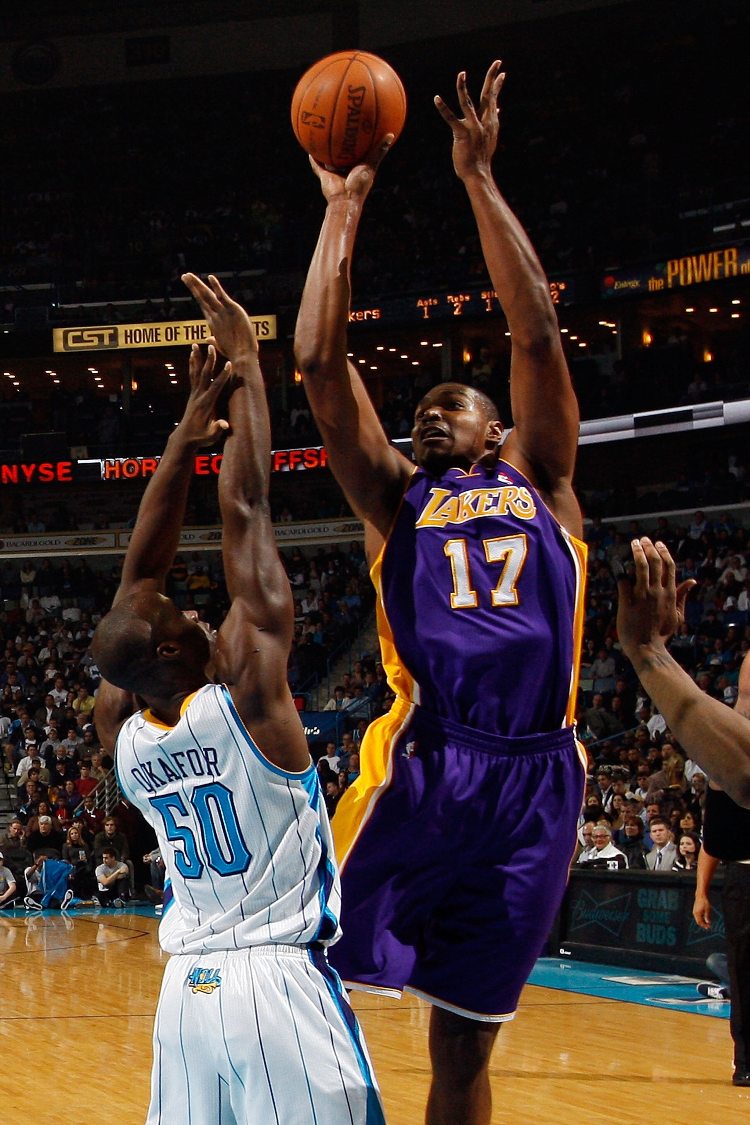 NEW ORLEANS, LA - DECEMBER 29:  Andrew Bynum #17 of the Los Angeles Lakers shoots the ball over Emeka Okafor #50 of the New Orleans Hornets at the New Orleans Arena on December 29, 2010 in New Orleans, Louisiana.   NOTE TO USER: User expressly acknowledge