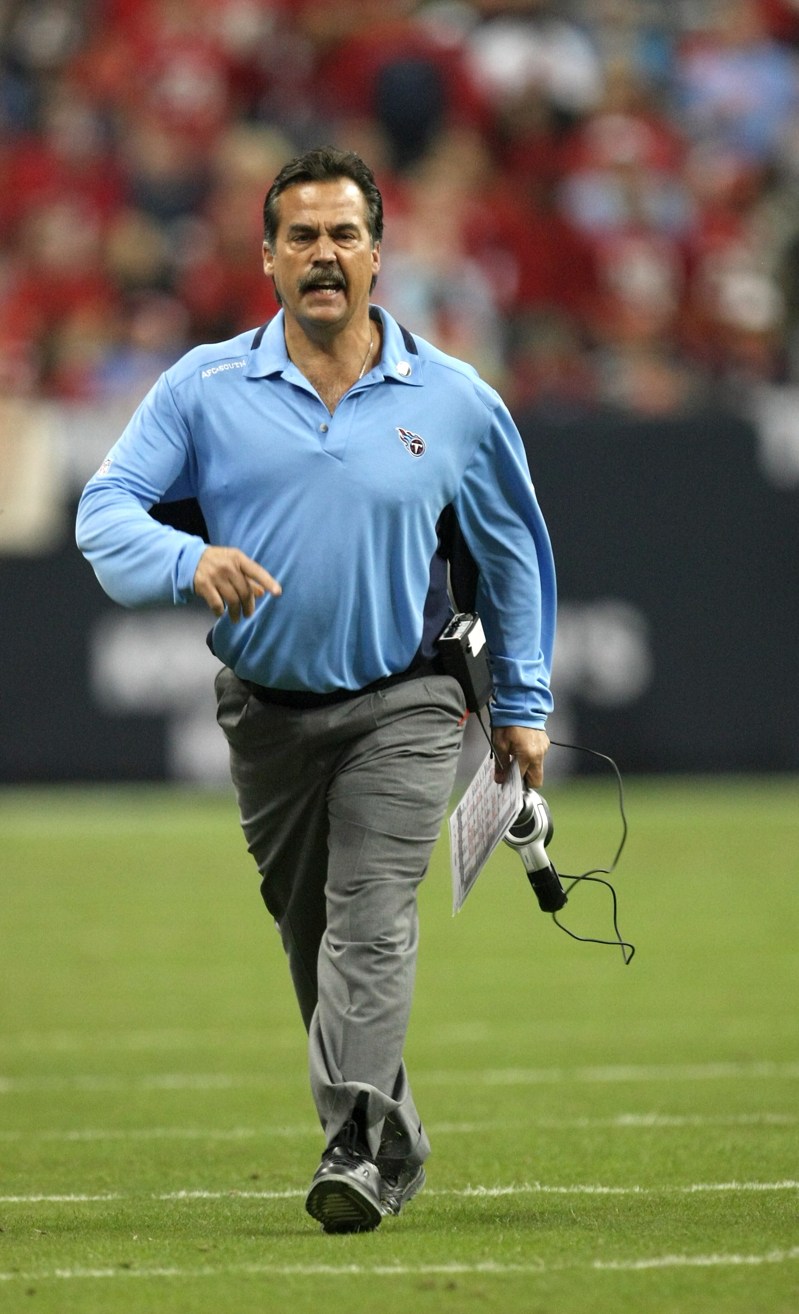 HOUSTON - NOVEMBER 23:  Head coach Jeff Fisher of the Tennessee Titans complains to the officials during the game with the Houston Texans on November 23, 2009  at Reliant Stadium in Houston, Texas.  The Titans won 20-17.  (Photo by Stephen Dunn/Getty Imag