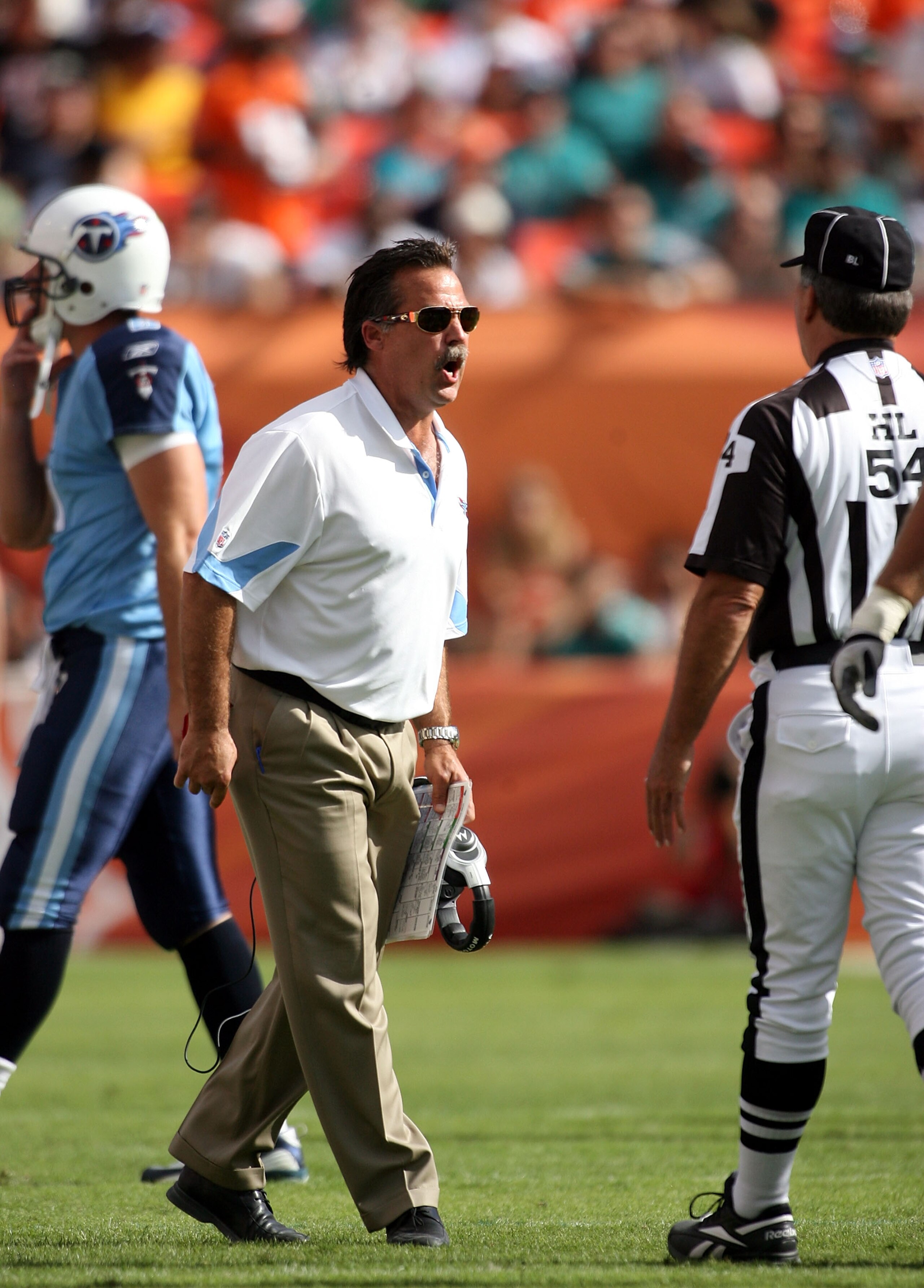 MIAMI - NOVEMBER 14:  Coach Jeff Fisher of the Tennessee Titans shouts against the Miami Dolphins at Sun Life Stadium on November 14, 2010 in Miami, Florida.  (Photo by Marc Serota/Getty Images)