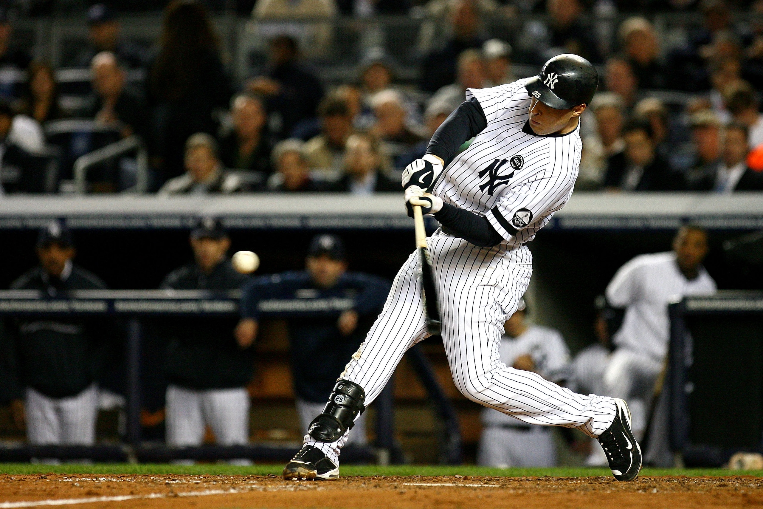 NEW YORK - OCTOBER 19: Mark Teixeira #25 of the New York Yankees bats against the Texas Rangers in Game Four of the ALCS during the 2010 MLB Playoffs at Yankee Stadium on October 19, 2010 in the Bronx borough of New York City. (Photo by Andrew Burton/Ge NEW YORK - OCTOBER 19: Mark Teixeira #25 of the New York Yankees bats against the Texas Rangers in Game Four of the ALCS during the 2010 MLB Playoffs at Yankee Stadium on October 19, 2010 in the Bronx borough of New York City. (Photo by Andrew Burton/Ge