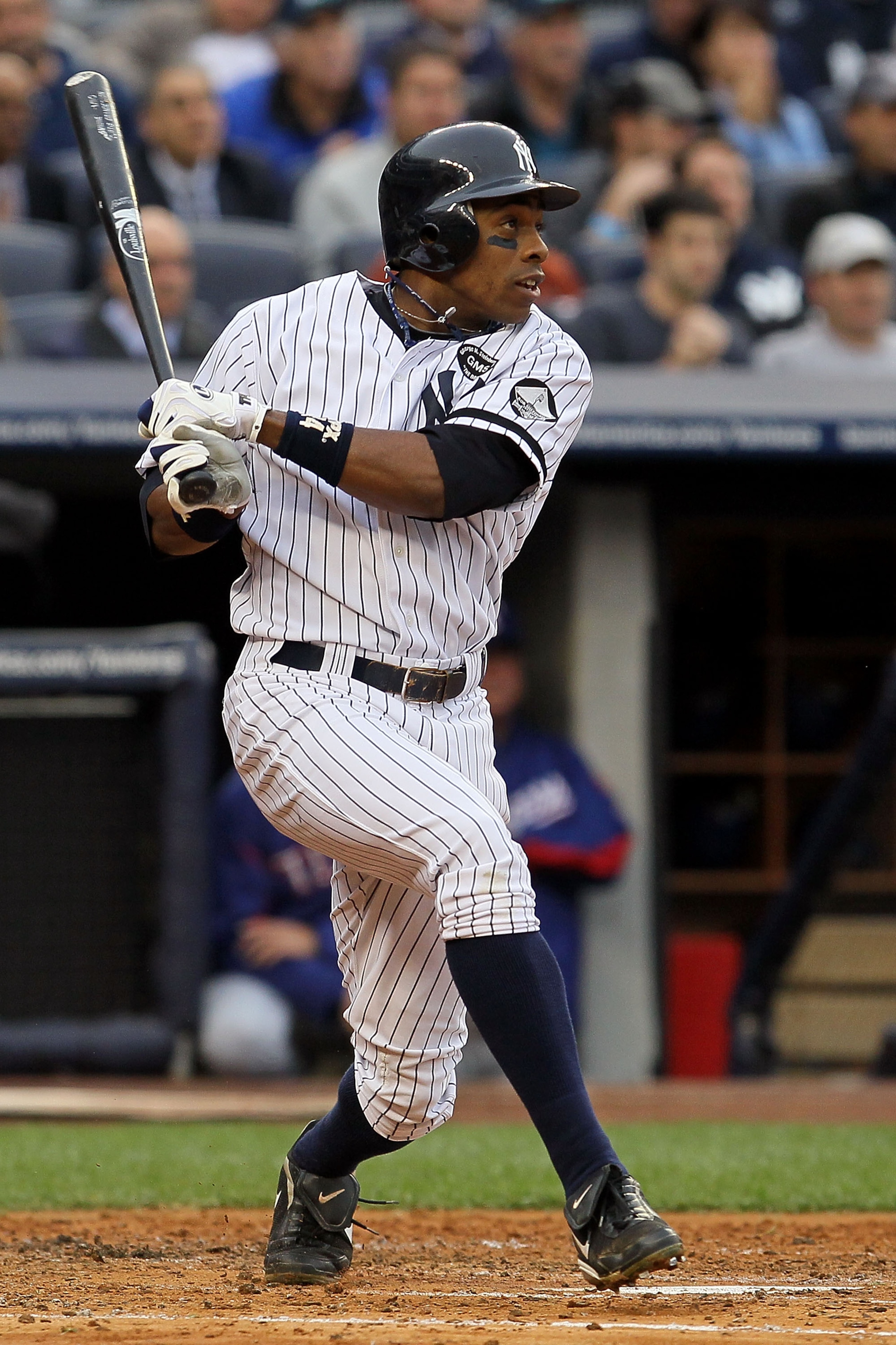 NEW YORK - OCTOBER 20:  Curtis Granderson #14 of the New York Yankees hits a single in the bottom of the second inning against the Texas Rangers in Game Five of the ALCS during the 2010 MLB Playoffs at Yankee Stadium on October 20, 2010 in the Bronx borou