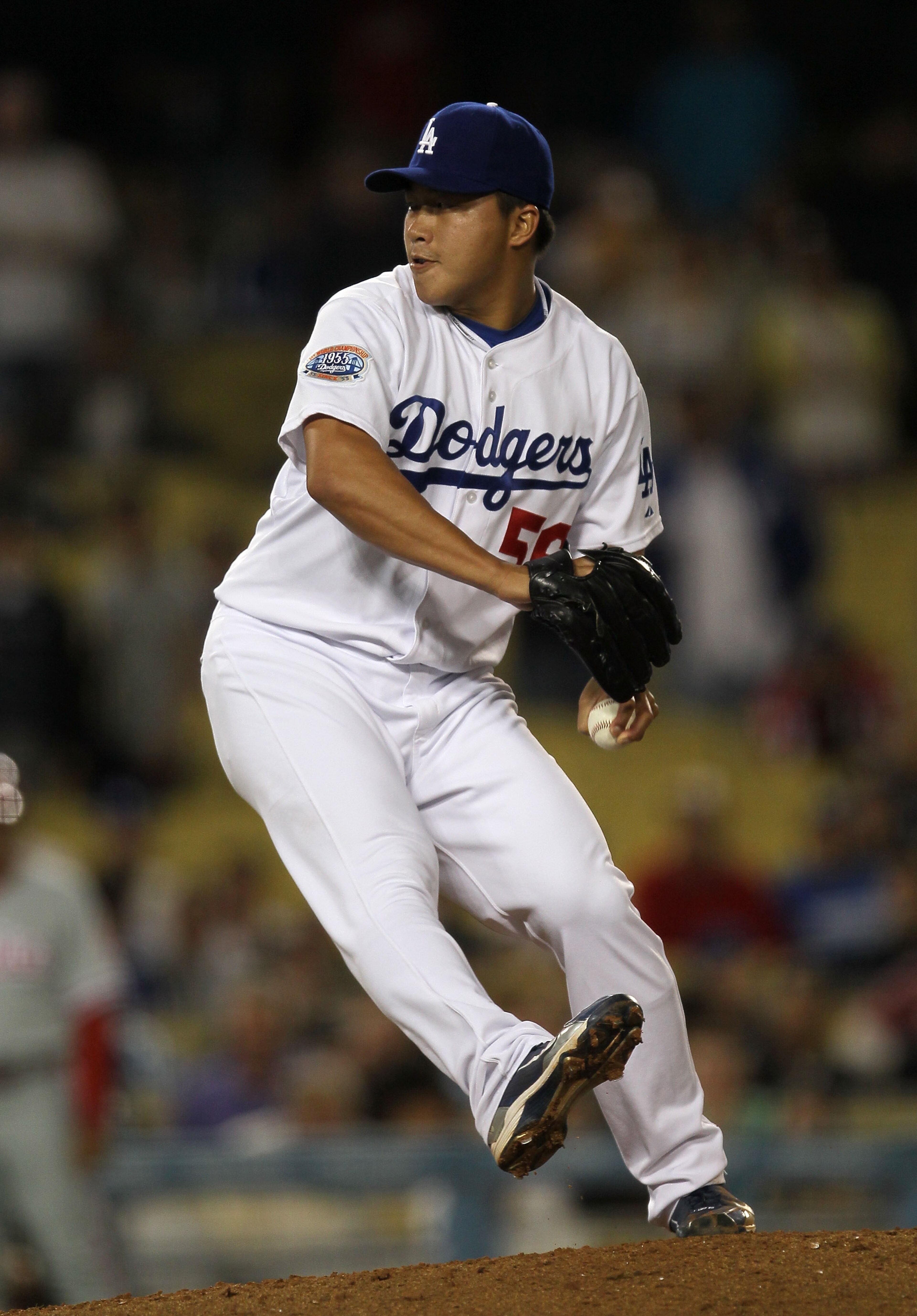 LOS ANGELES, CA - AUGUST 30: Hong-Chih Kuo #56 of the Los Angeles Dodgers throws a pitch against the Philadelphia Phillies on August 30, 2010 at Dodger Stadium in Los Angeles, California. Kuo picked up the save as the Dodgers won 3-0. (Photo by Stephen LOS ANGELES, CA - AUGUST 30: Hong-Chih Kuo #56 of the Los Angeles Dodgers throws a pitch against the Philadelphia Phillies on August 30, 2010 at Dodger Stadium in Los Angeles, California. Kuo picked up the save as the Dodgers won 3-0. (Photo by Stephen