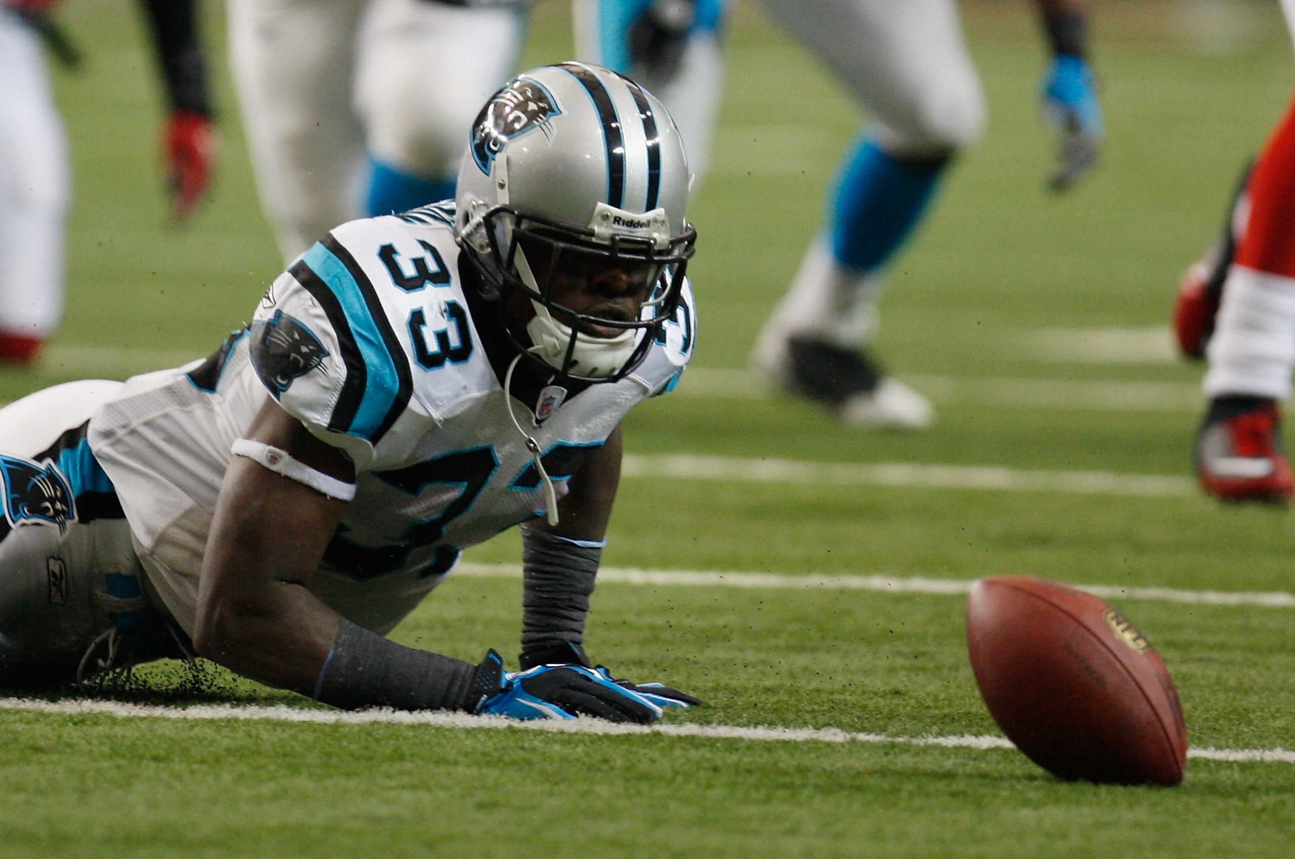 ATLANTA, GA - JANUARY 02: Mike Goodson#33 of the Carolina Panthers loses a fumble in the second quarter during their game against the Atlanta Falcons at the Georgia Dome on January 2, 2011 in Atlanta, Georgia. (Photo by Scott Halleran/Getty Images) ATLANTA, GA - JANUARY 02: Mike Goodson#33 of the Carolina Panthers loses a fumble in the second quarter during their game against the Atlanta Falcons at the Georgia Dome on January 2, 2011 in Atlanta, Georgia. (Photo by Scott Halleran/Getty Images)