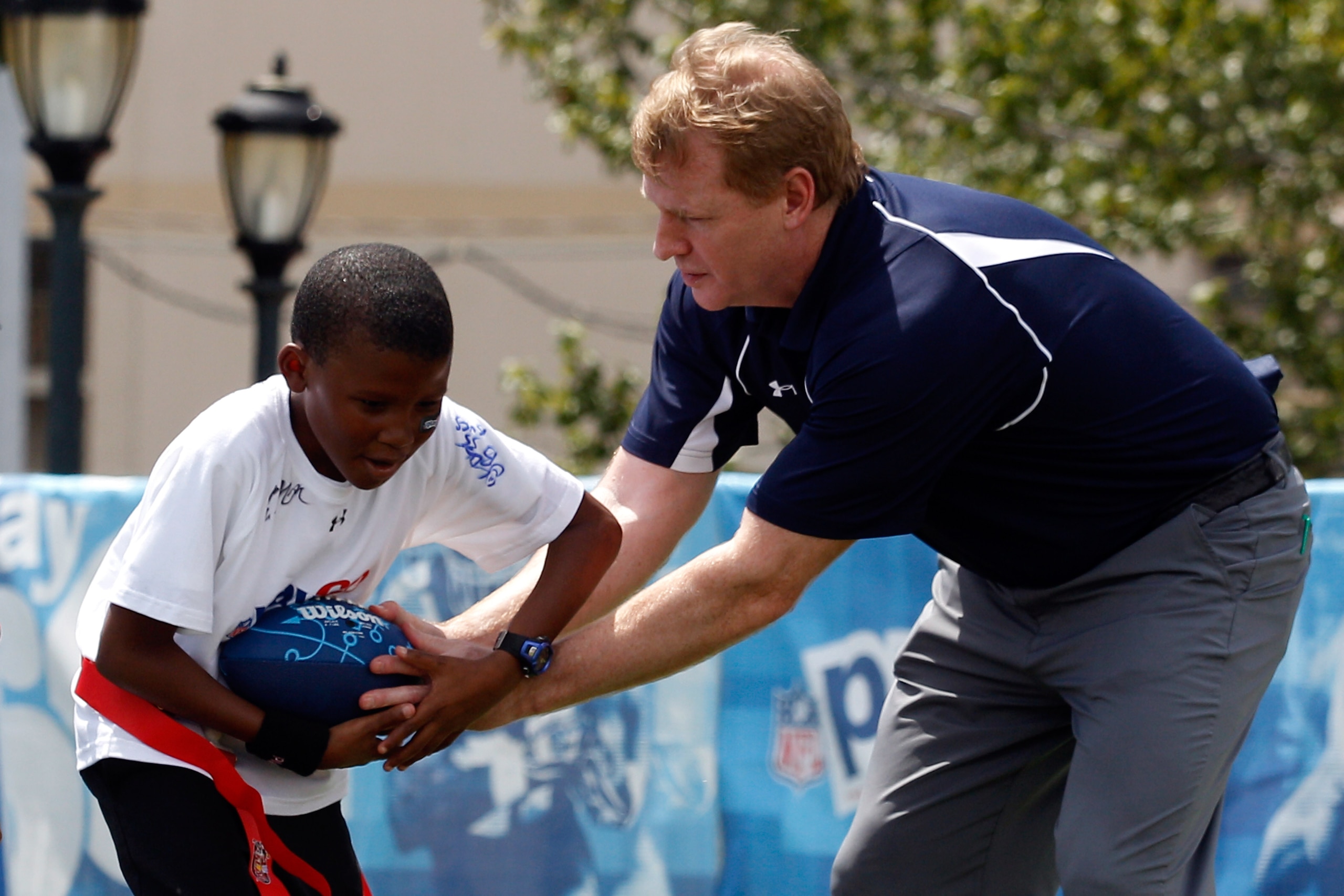 NEW ORLEANS - SEPTEMBER 08: NFL commissioner Roger Goodell plays on the field during the NFL�s Play 60 campaign to fight childhood obesity at Brock Elementary School September 8, 2010 in New Orleans, Louisiana. Obama joined NFL Commissioner Roger Goodel NEW ORLEANS - SEPTEMBER 08: NFL commissioner Roger Goodell plays on the field during the NFL�s Play 60 campaign to fight childhood obesity at Brock Elementary School September 8, 2010 in New Orleans, Louisiana. Obama joined NFL Commissioner Roger Goodel