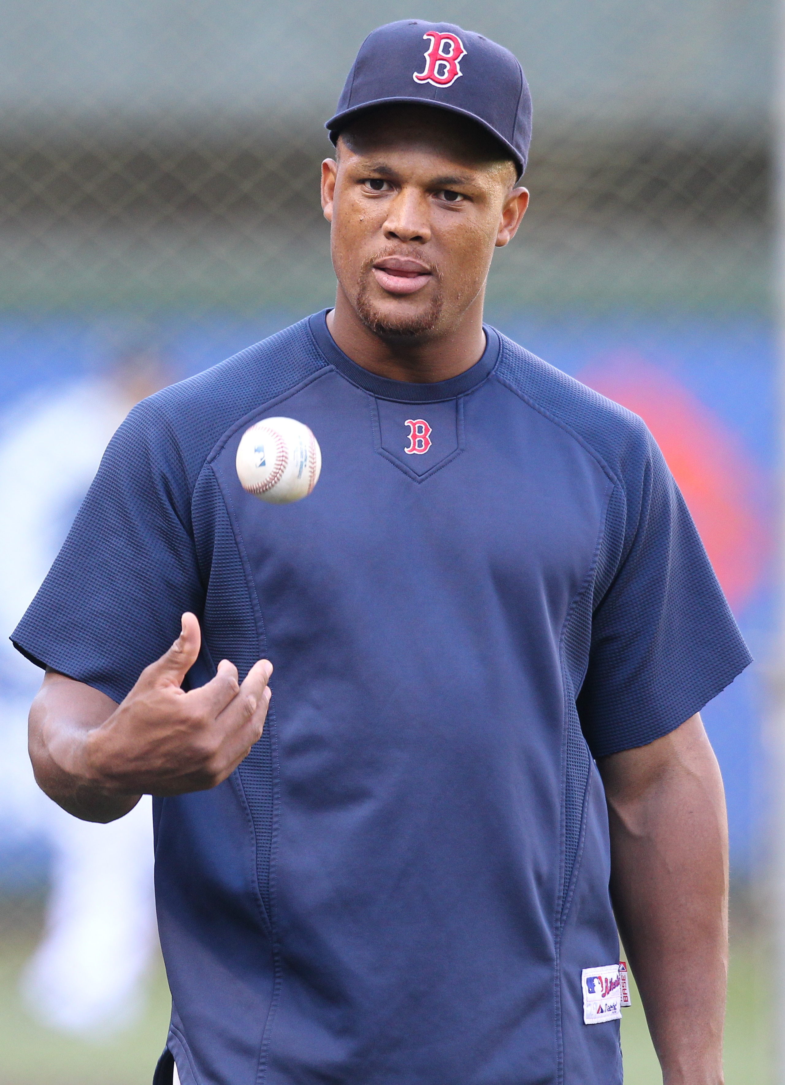 SEATTLE - SEPTEMBER 13:  Adrian Beltre #29 of the Boston Red Sox tosses the baseball during batting practice prior to the game against the Seattle Mariners at Safeco Field on September 13, 2010 in Seattle, Washington. (Photo by Otto Greule Jr/Getty Images
