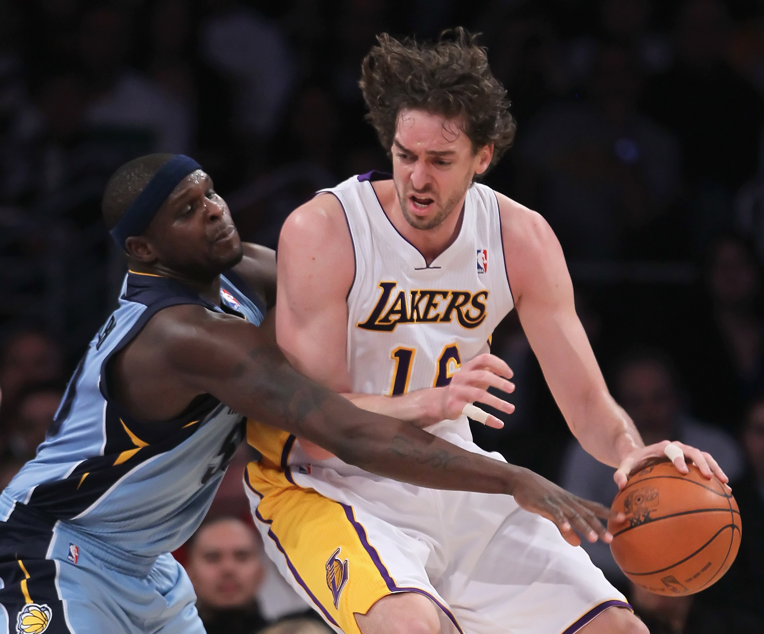 LOS ANGELES, CA - JANUARY 02: Zach Randolph #50 of the Memphis Grizzlies attempts to steal the ball away from Pau Gasol #16 of the Los Angeles Lakers during the first half at Staples Center on January 2, 2011 in Los Angeles, California. The Grizzlies def LOS ANGELES, CA - JANUARY 02: Zach Randolph #50 of the Memphis Grizzlies attempts to steal the ball away from Pau Gasol #16 of the Los Angeles Lakers during the first half at Staples Center on January 2, 2011 in Los Angeles, California. The Grizzlies def